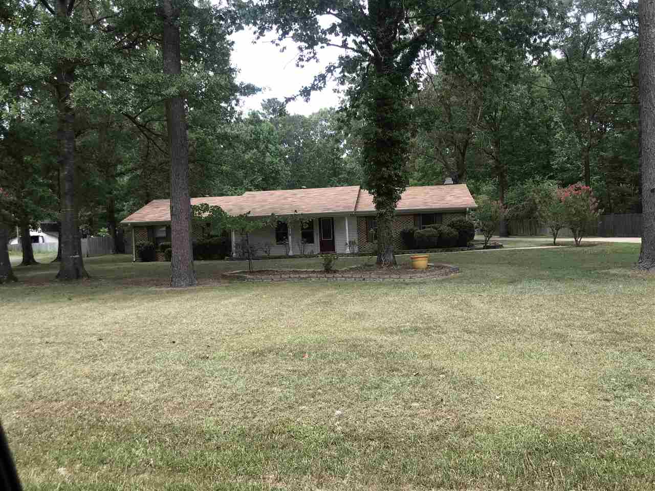 THIS IS A GREAT OPPORTUNITY!! QUIET COUNTRY LIVING, NICE HOME WITH 4 BEDROOMS, A HEATED AND COOLED SUNROOM, KITCHEN WITH CORIAN STONE COUNTER TOPS, WOOD FLOORS, CARPET BEDROOMS. WALKWAY OUTBACK TO A BEAUTIFUL POOL, A SHOP, AND WONDERFUL FENCED IN BACK YARD.  NEW ROOF,NEW SIDING, AND NEW PAINT INSIDE.  NEW PAINT IN KITCHEN AND LAUNDRY ROOM, CABINETS!!!!