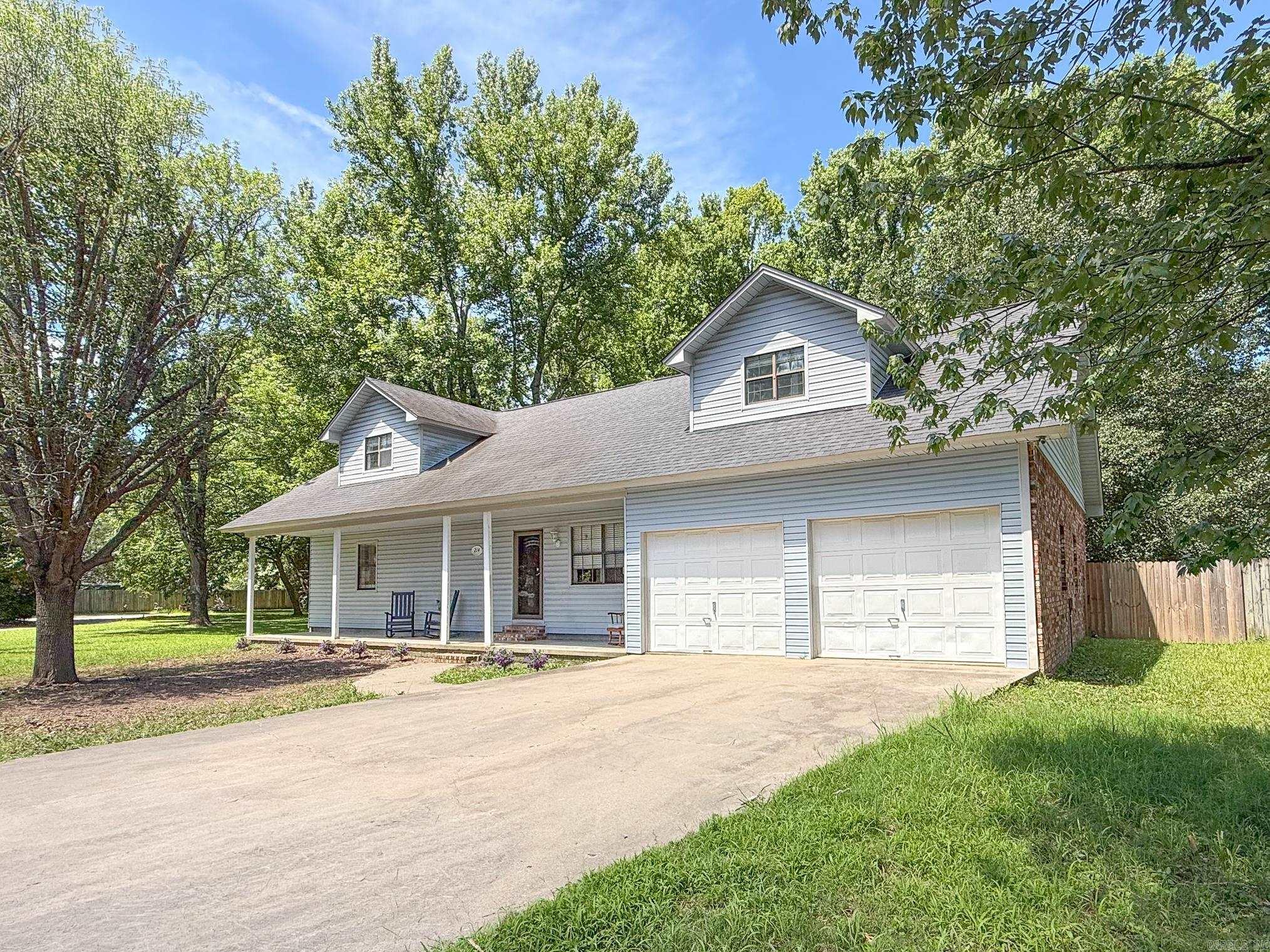 Welcome home to this spacious 4 bedroom, 2 bathroom home in Cabot! The charming front porch offers the perfect spot to relax and unwind before stepping inside to a cozy living area featuring a fireplace. The updated kitchen is sure to impress with tile flooring, tile backsplash, granite countertops, and all new stainless steel appliances. The beautifully updated bathrooms add a fresh, modern touch to the home. The main level also includes two bedrooms, a full bathroom, and a large laundry room with plenty of space for storage and everyday convenience. Upstairs, you'll find two additional bedrooms, each with access to a full bathroom, along with a large bonus room that provides endless possibilities for a playroom, media room, home office, or workout space. Just off the bonus room is an additional nook that would make the perfect craft area, study space, or hobby room. Step outside to enjoy the expansive deck with a covered roof, ideal for entertaining guests or enjoying quiet evenings outdoors. With flexible living spaces both inside and out, this Cabot home offers room for everyone to spread out and make it their own.
