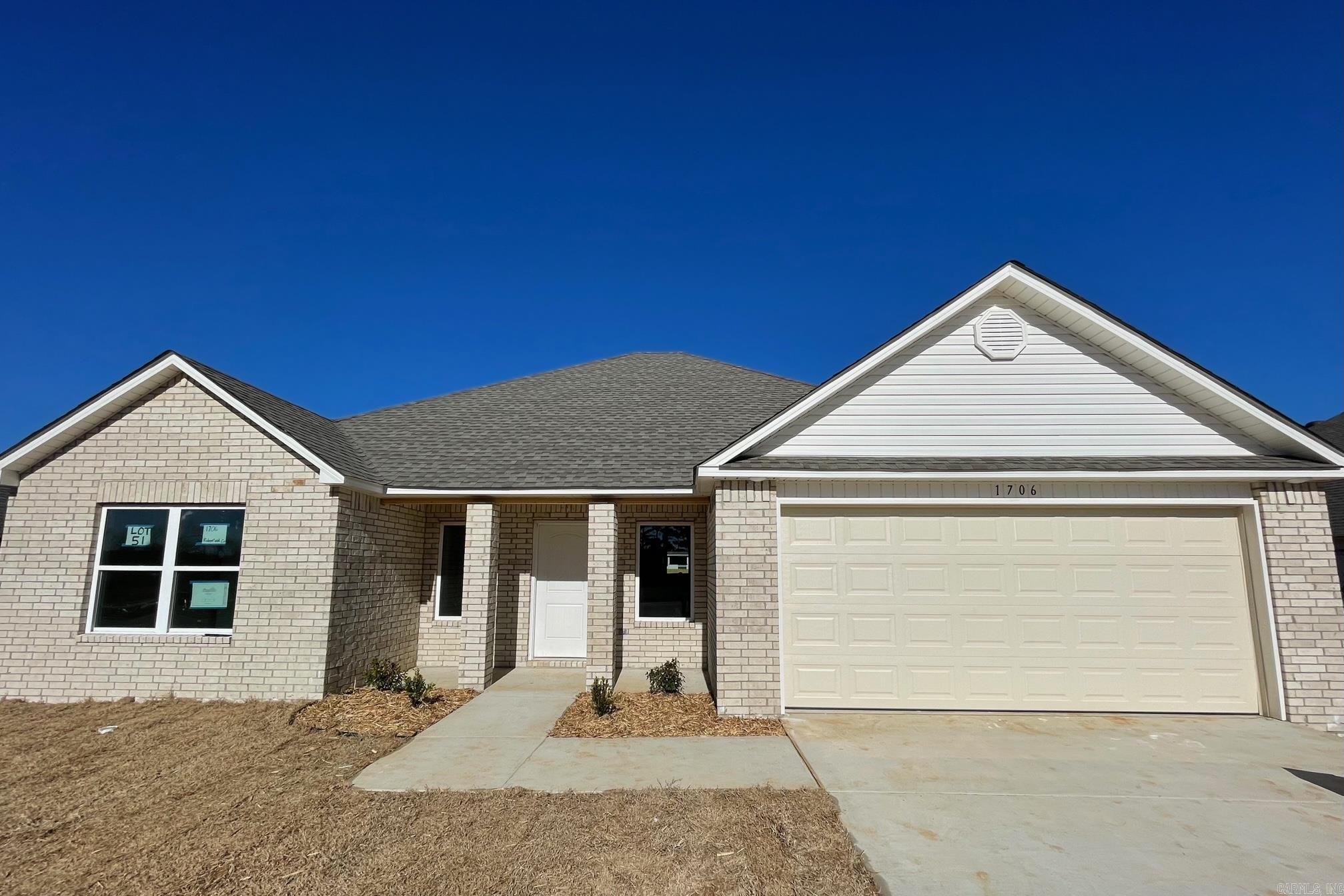 The Washington plan is beautiful inside and out, with architectural details that are unlike any other plan in the community. A beautiful, unique entry welcomes you into a home with a large Living Room, spacious Kitchen, and generously sized Master Suite.   Upgrades included in this home: side brick on home, 8/12 roof with architectural shingles, plumbing faucet upgrade 2, 8" deep Kitchen sink, 50 gallon water heater, added cable jack, HVAC rigid duct upgrade, staggered Kitchen cabinets, Luxury Vinyl Plank flooring in wet areas, raised ceilings in Living Areas per municipal requirements, Cheyenne style interior doors, baseboards level 2, LED disk lights in Kitchen, full sod, microwave hood in Kitchen, smooth top range.     THIS HOME IS SCHEDULED TO BE COMPLETE IN LATE NOVEMBER.