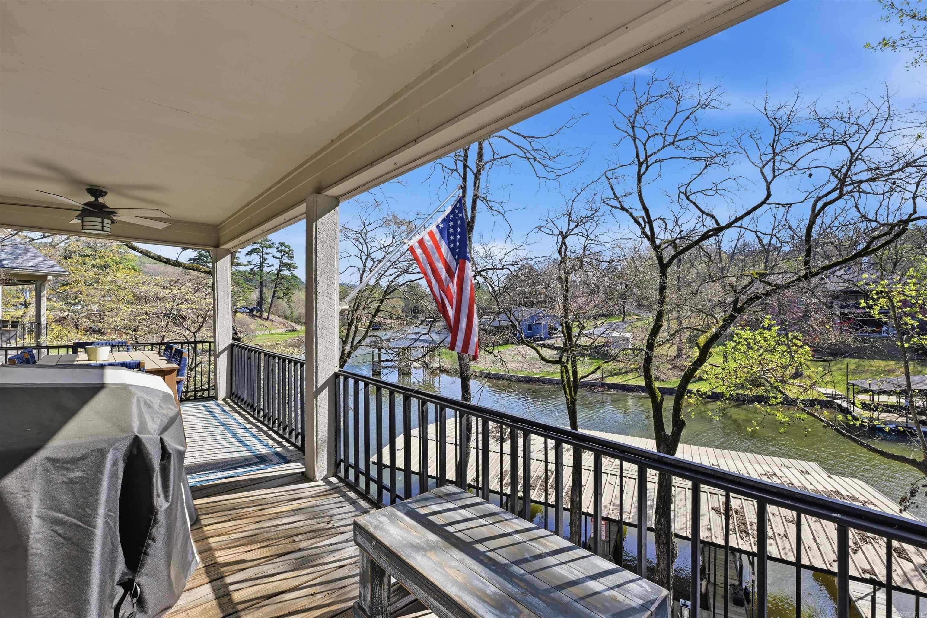 Welcome to lake living at its finest! This beautifully maintained 2-bedroom, 2-bath condo at 1201 Airport Road, Unit B8 in Hot Springs offers the perfect blend of comfort, convenience, and waterfront lifestyle. Step inside to find a spacious and inviting layout, ideal for both relaxing and entertaining. The living area flows seamlessly onto a stunning back deck—perfect for enjoying your morning coffee or unwinding in the evening while taking in the peaceful surroundings. This property includes a coveted boat slip, giving you direct access to the main lake for endless days of boating, fishing, and fun on the water. Located just minutes from the highway, you’ll enjoy easy access to all that Hot Springs has to offer, including dining, shopping, and entertainment. Whether you’re looking for a full-time residence or weekend getaway, this condo checks all the boxes. Plus, it can be purchased fully furnished, making it truly move-in ready! Don’t miss your chance to own a slice of lake life—schedule your showing today!