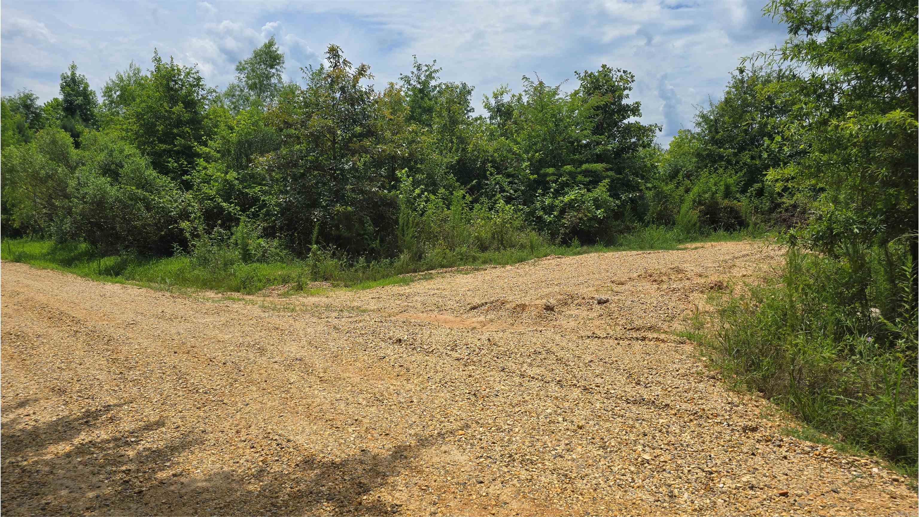 With no zoning or deed restrictions, welcome to a life of total freedom, but with power and water available, you won’t have to sacrifice urban conveniences.  -Owner Financing Available -No Restrictions! -Very Buildable: Flat, No Floodplain -Driveway Entry -Water & Power along Road -New Road & Drainage Infrastructure -New Survey   This peaceful, freshly surveyed tract boasts a short driveway that connects to 112 feet of public gravel road frontage on the NEWLY RESURFACED Ellison Rd.