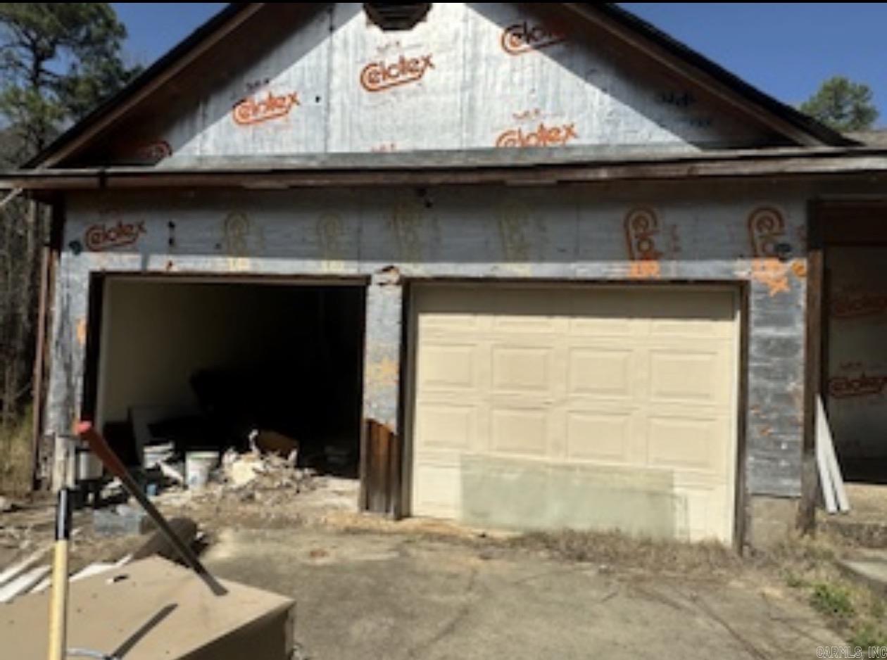 Endless possibilities await wit this spacious 2,234 square foot home situated on 5 beautiful acres outside the city limits. This property has been gutted and is ready for renovation providing an opportunity for investors, builders or buyers.