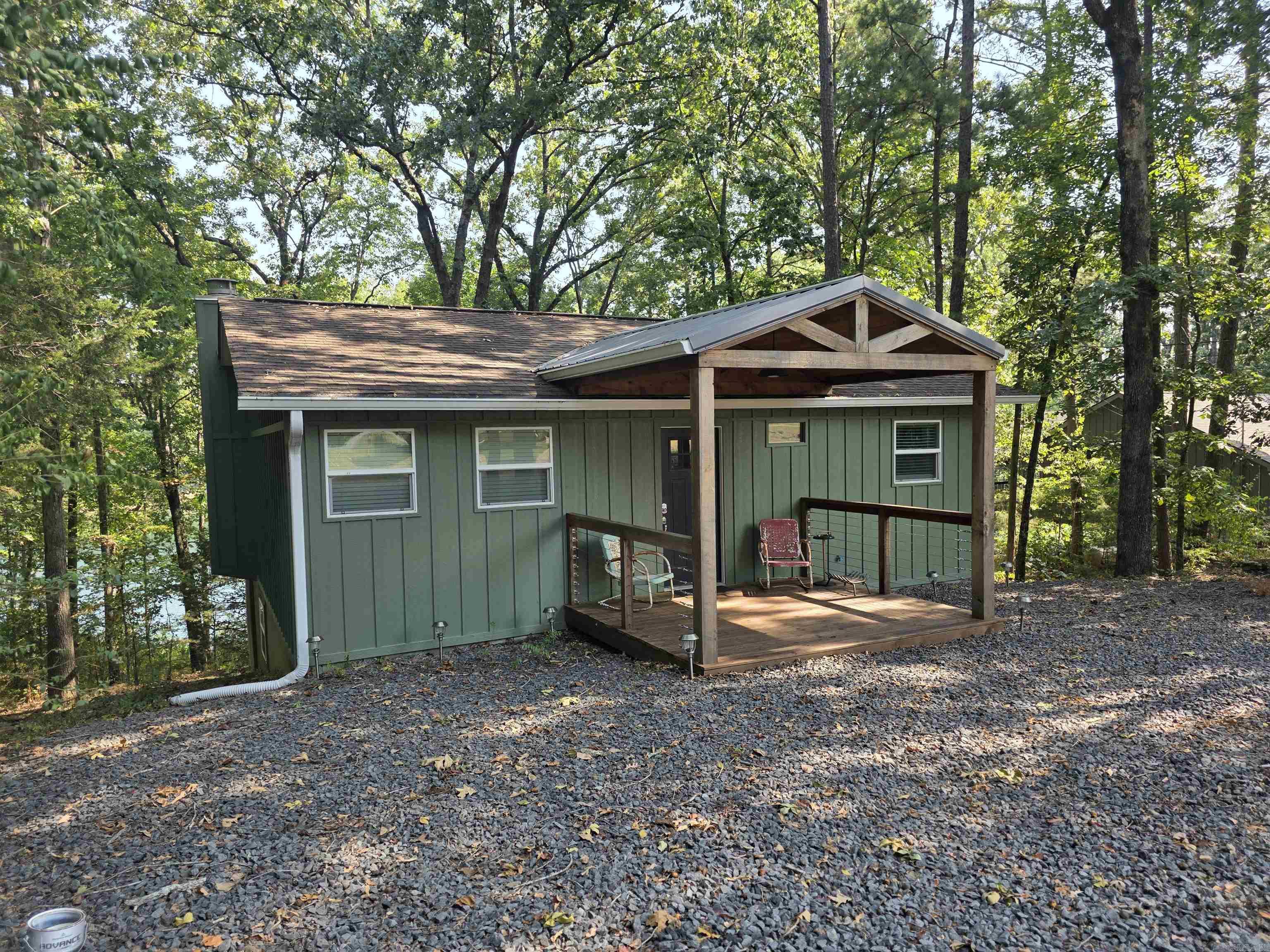 LAKE LIFE awaits you in this almost 1800 sq ft, 4 bed 2 bath LAKEFRONT home. Easy walk to the shoreline and very low white line so your view could really be opened up. It is very rare to have both Lakefront and a good lake view! HVAC is only 2 years old and brand new large deck with cable for an unrestricted view of the lake! Freshly painted new Hardie board exterior and new LVP flooring throughout. This is the first time this home has ever been on the market. Has been in the family since it was built in 1978. You don't want this one to slip by you!