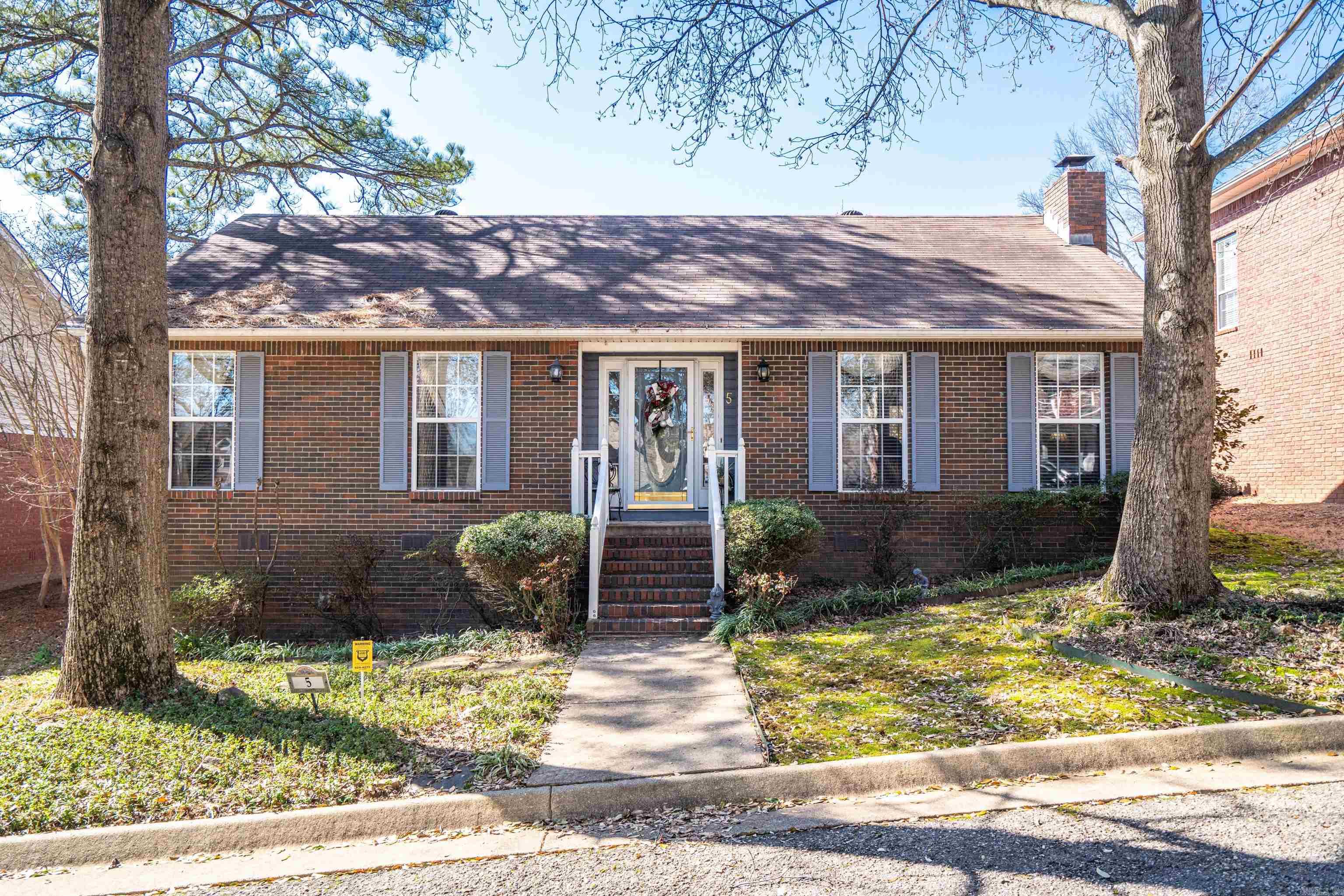 This cute small home is located in beautiful TownSquare. It is convenient to shopping, restaurants, hospitals and golf at the Hot Springs Country Club. TownSquare is a gated and securely fenced, serene, and tree shaded neighborhood!  This fabulous floor plan offers two master suites completely separated by the rest of the home. The welcoming foyer opens to a living room centered by a handsome fireplace with gas logs. The spacious kitchen is open to a small dining area. Entering the home from the double garage, there is a mud room area and laundry room. This home easily overflows to a covered patio overlooking a lovely privately fenced backyard.
