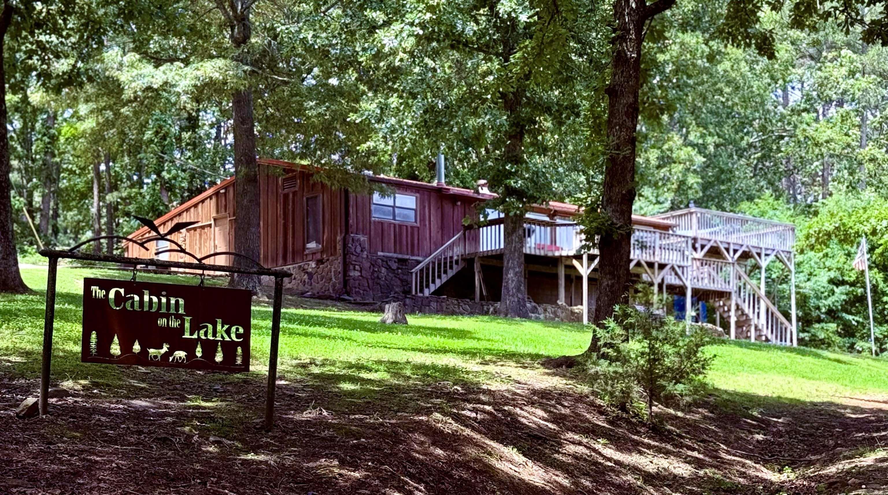 Adorable Lake View with an amazing view of Greers Ferry Lake. Sold furnished! Ready to move in! Great Investment potential! Has been previously used as an AIR BNB. Buit in Bunk beds to make room for everyone!!!  Deck access from two of the bedrooms and living room! Call today for your private showing.