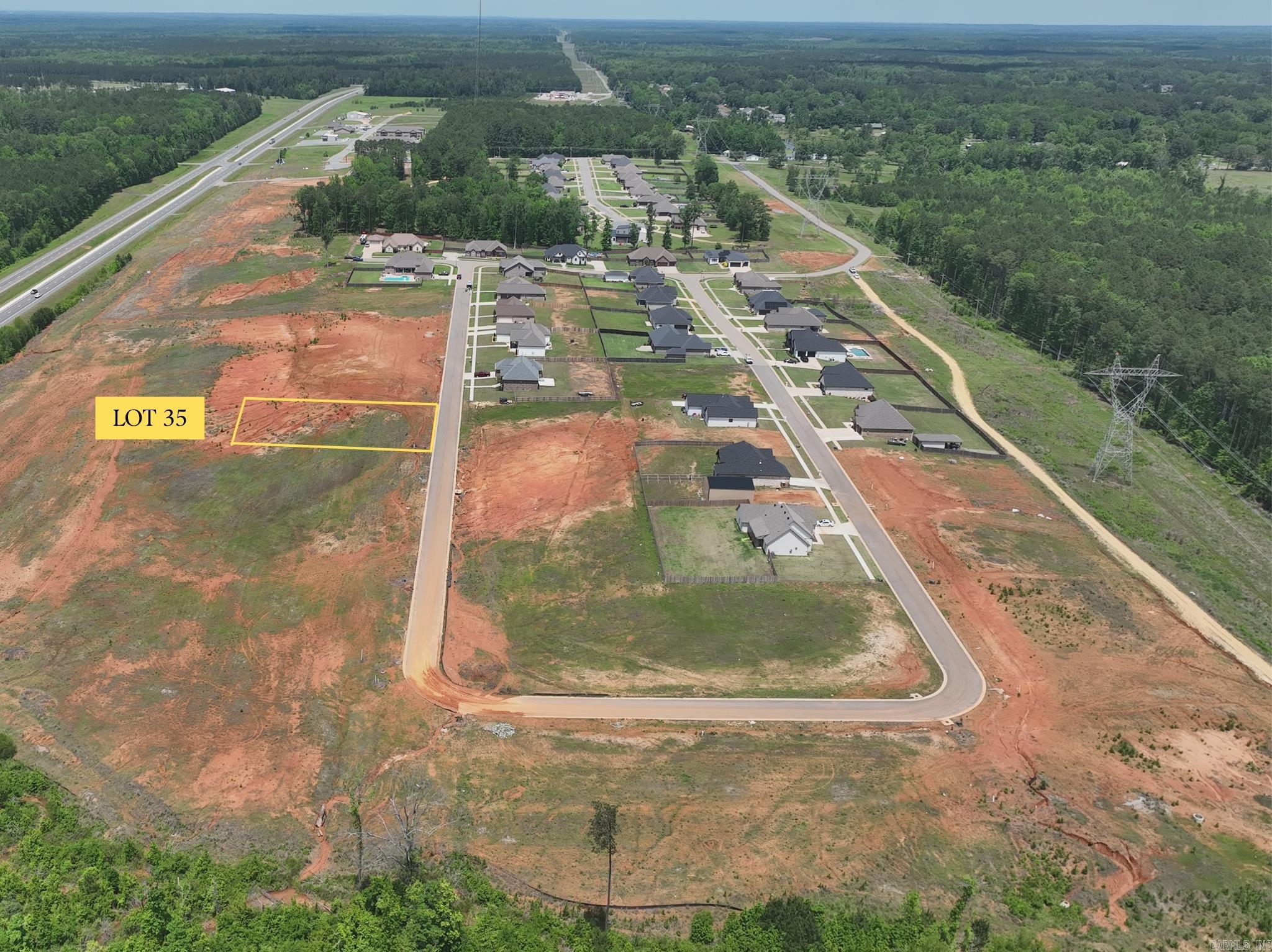 Build your future home in the peaceful Oak Tree South subdivision in Sheridan, Arkansas. Lot 35 offers a convenient location just minutes from Hwy 167, providing quick access to Sheridan, Little Rock, and surrounding areas while still enjoying a quiet residential setting. This homesite combines small-town comfort with easy access to shopping, dining, schools, and everyday amenities. Don’t miss this opportunity to own a residential lot in one of Sheridan’s growing areas.