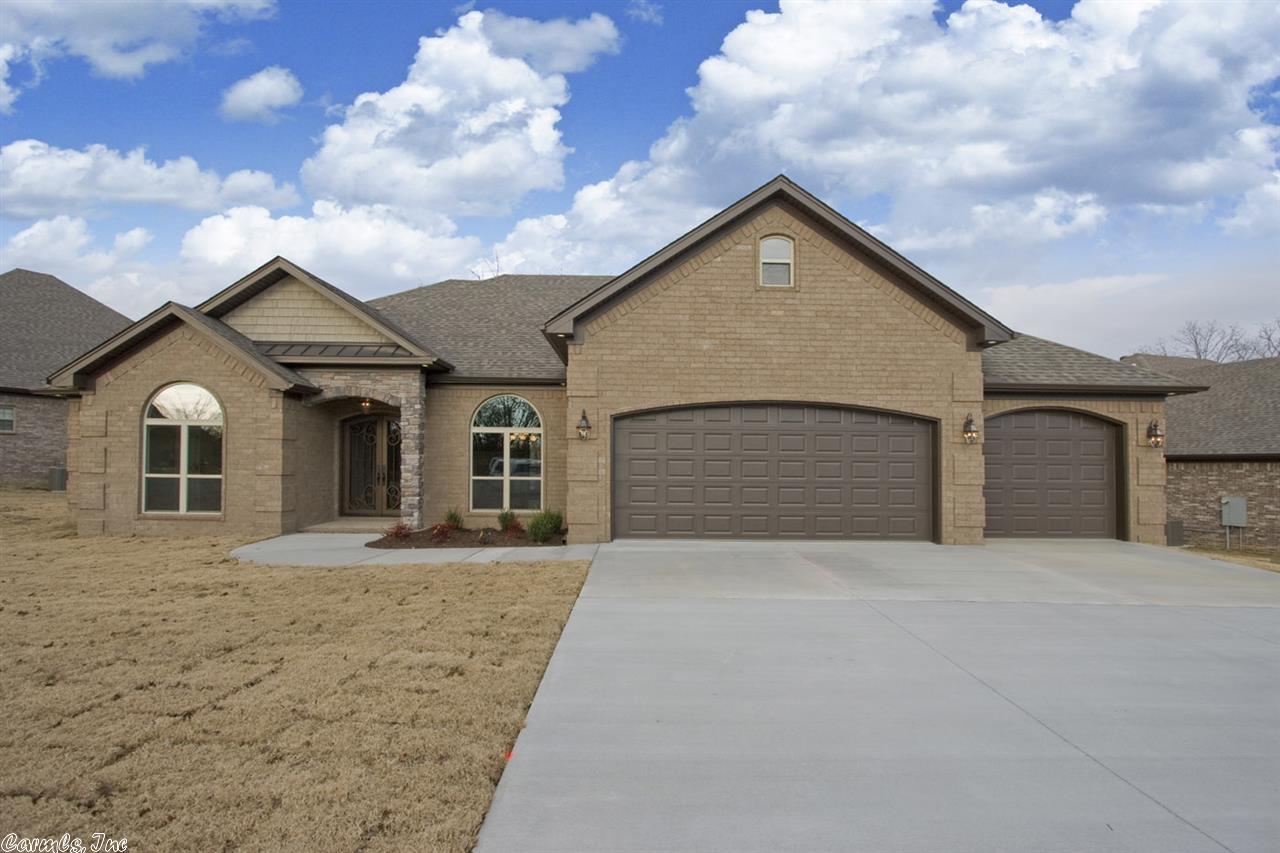 ABSOLUTELY  GORGEOUS HIGH-END HOME IN MOST SOUGHT AFTER NEIGHBORHOOD! CUSTOM DESIGNED OPEN FLOORPLAN, STACKED ROCK ARCHED ENTRY, CUSTOM ORNAMENTAL  IRON SECURITY DOORS WITH HINGED HURRICANE GLASS INSERT, BEAUTIFUL CROWN MOLDING AND TRIM, BEAUTIFUL HARDWOOD FLOORS, SOLID GRANITE, STAINED CABINETRY W/CUSTOM WOOD STAINED VENT HOOD WITH SPICE RACK PULL-OUTS, HUGE MASTER SUITE WITH VERY OPEN HUGE MASTER BATH, OFFICE NOOK, COVERED PATIO, 3 CAR GARAGE, GUTTERS, EXTRA LANDSCAPING...A TRUE "MUST SEE"