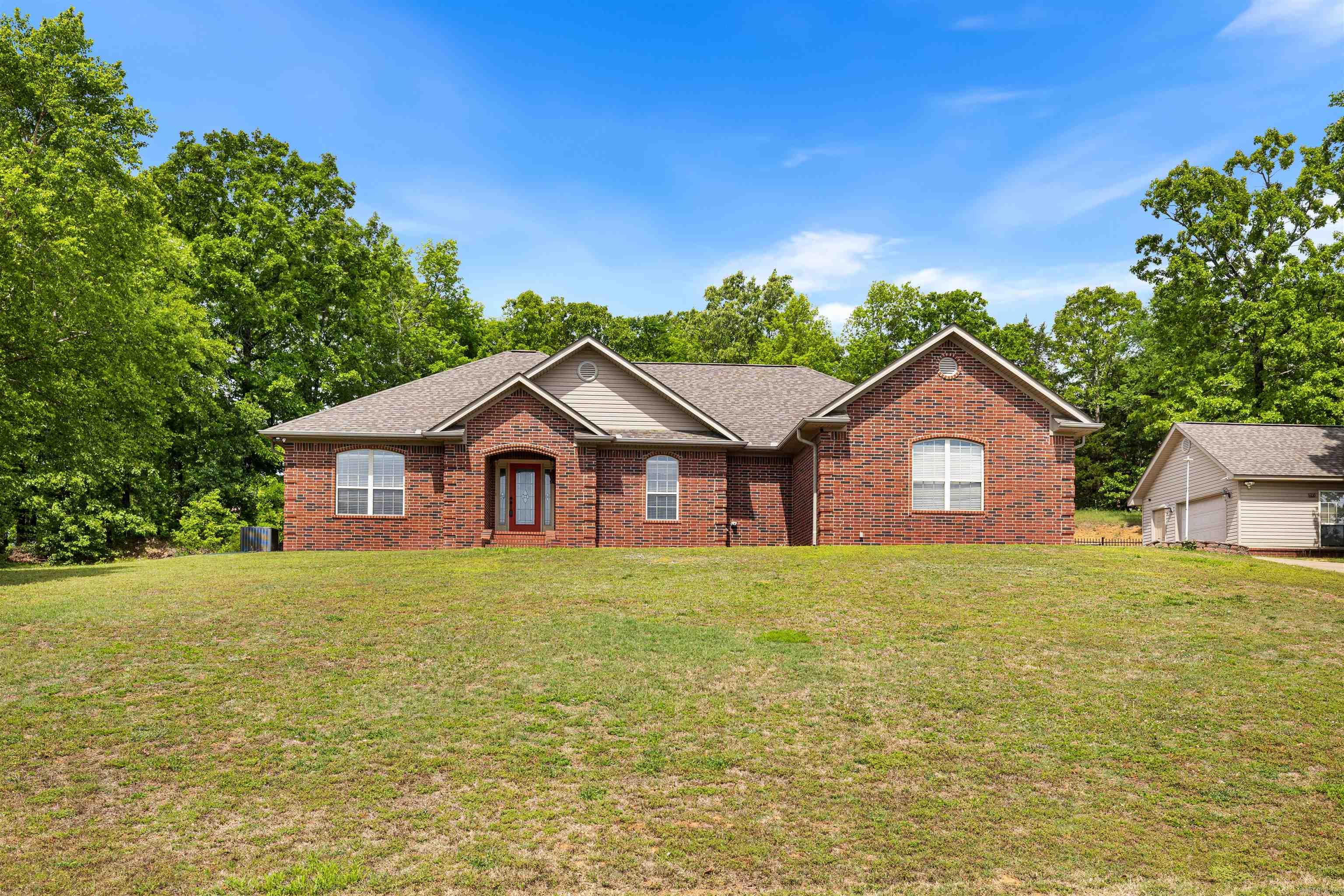 A beautifully maintained home offering the perfect blend of comfort, space, & convenience. This 3-bed/2bath home sits on a peaceful corner lot with mature landscaping & curb appeal that invites you in. Inside, you’ll find an open & inviting floor plan with a spacious living area, abundant natural light, & tasteful finishes throughout. The kitchen is designed with functionality in mind, featuring ample cabinetry & counter space for cooking or entertaining. The primary suite provides a relaxing retreat with a private bath & generous closet space, while the additional bedrooms offer flexibility for family, guests, or a home office. Recent updates include: New water heater & 1-AC units 2023, new roof 2024, new LVP floors garbage disposal 2025, & new ALL electric range installed October 2025. Moving outside, enjoy the fenced backyard with a covered grilling patio, ideal for gatherings or quiet evenings. A two-car garage with a "STEEL STORM SHELTER" plus a shop adds room for vehicles, hobbies, or storage. Nestled in a quiet neighborhood yet just minutes from schools, shopping, and dining, this home truly checks all the boxes. Schedule your private tour today!  Agents see showing remarks
