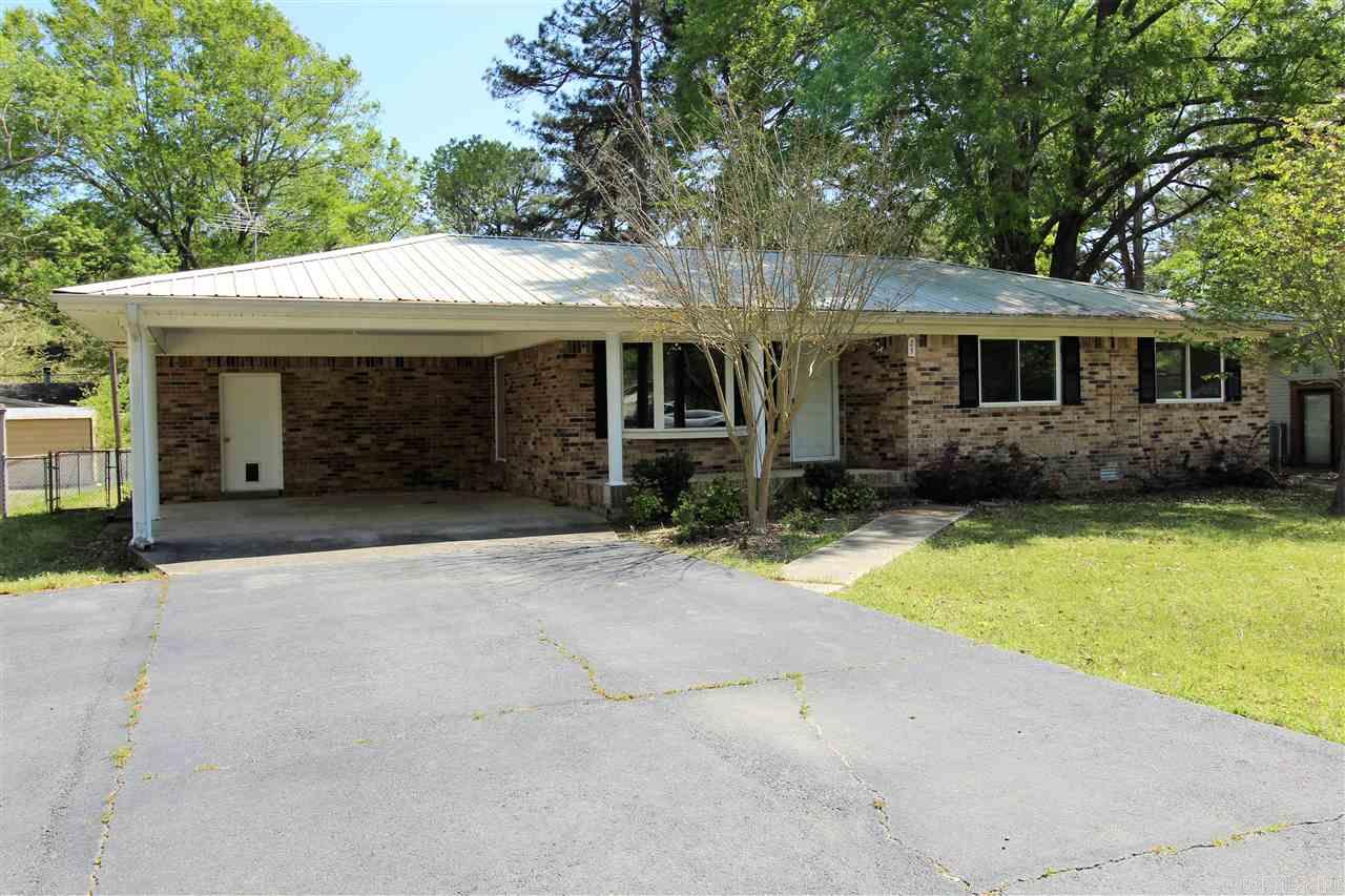 NICE BRICK HOME WITH METAL ROOF*no carpet*newer vinyl windows*updated HVAC & water heater*large sunroom*3 bed*2 bath*large laundry room*2-car carport*storage room in carport plus another storage building in the fenced backyard*1600 sq. ft.*READY TO MOVE IN AND MAKE IT YOURS!!!