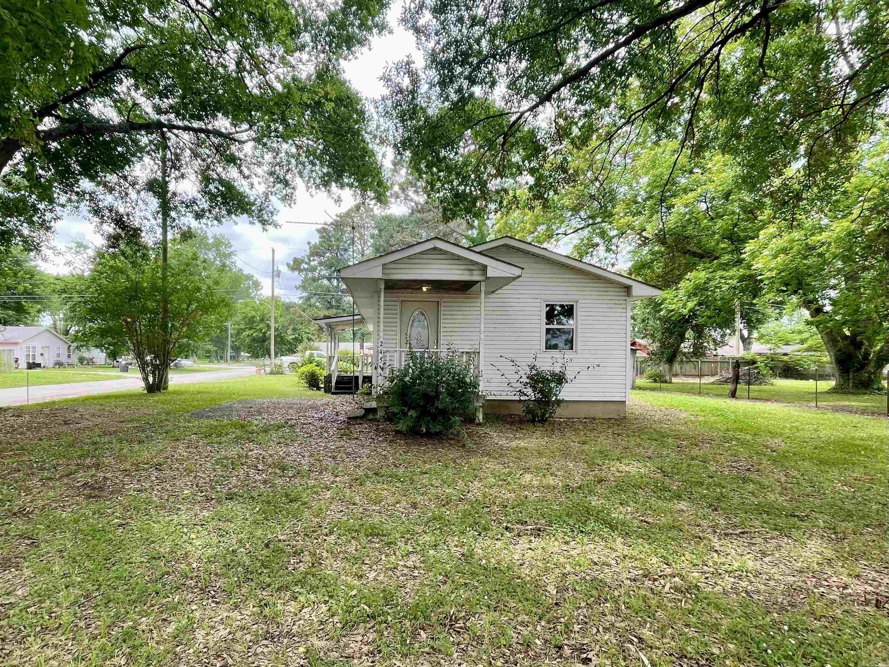 Investment opportunity in this 2 bedroom, 1 bath home on a nice corner lot. Remodel has already been started for you with new paint throughout and some updated flooring. Needs some TLC and it will be ready to go.