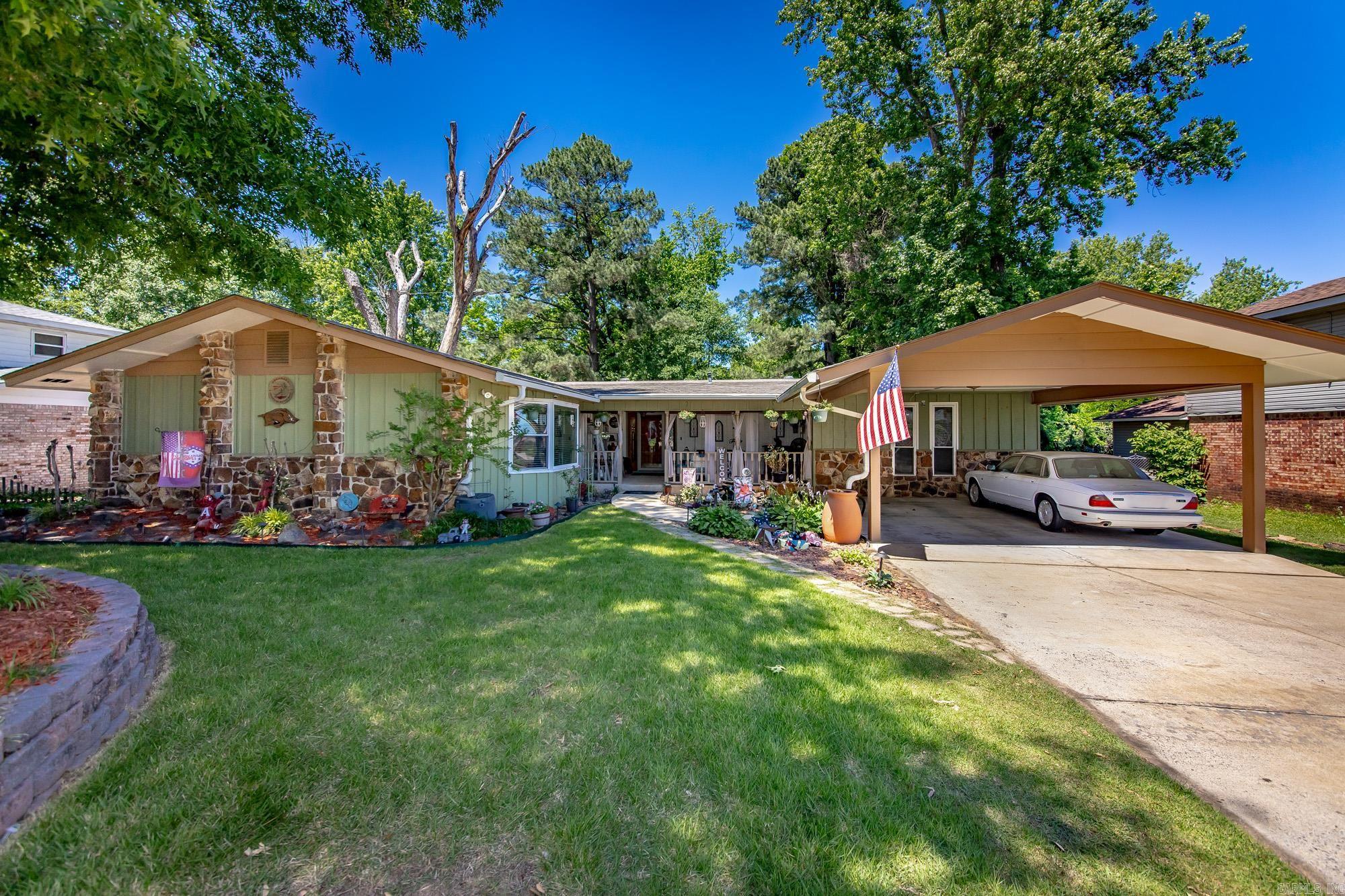 Are you looking for a 3 bedroom home plus office and sunroom that has been remodeled with plenty of space, storage, and a kitchen anyone would love?  This is it!!  Recent improvements include new paint throughout and new flooring within the last 2 years (bedrooms, office).  Seller updated primary bathroom and replaced roof with architectural shingles within the past 6 years.  New Central heat and air installed approx. 3 years ago!  A breakfast bar, kitchen/dining combo as well as formal dining provide plenty of seating for get togethers/guests.  Granite countertops, gas stove, and double ovens make this a chef's dream!  There is a huge storage room located directly off the living room to help with any of your storage needs!  The backyard is gorgeous with a beautiful pergola, new deck, and a small shop with electricity!