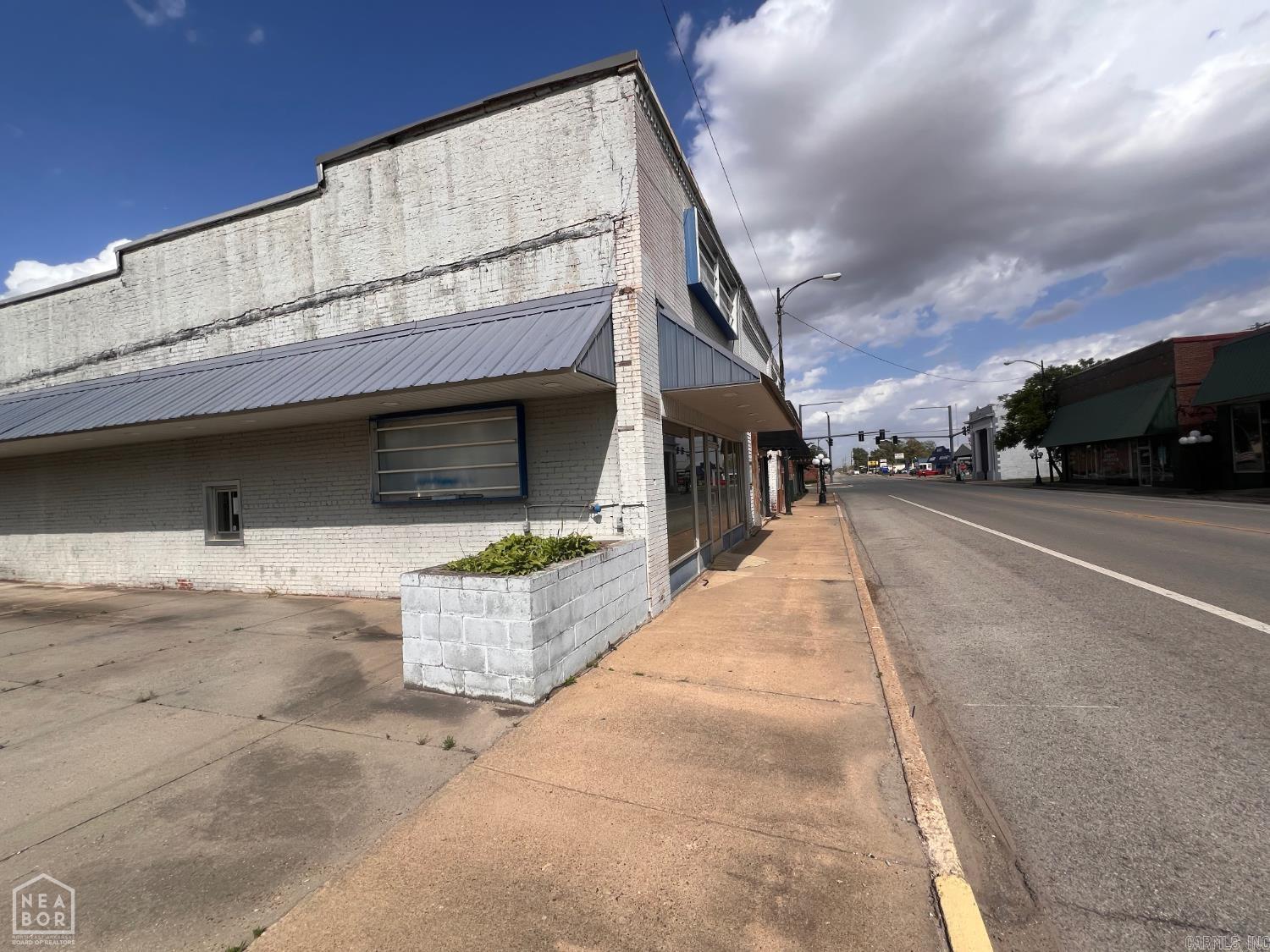 Great opportunity in small-town Monette! This versatile 6,000 SF flex property offers excellent curb appeal and strong potential for office, retail, showroom, light industrial, or warehouse use. It's a fixer-upper with an adaptable layout ready for your updates and vision. Priced accordingly for someone looking to create value in a welcoming community with convenient access. Ideal for entrepreneurs or investors seeking affordable space with room to grow. Cash or renovation-friendly buyers preferred. Contact us for details or a showing!