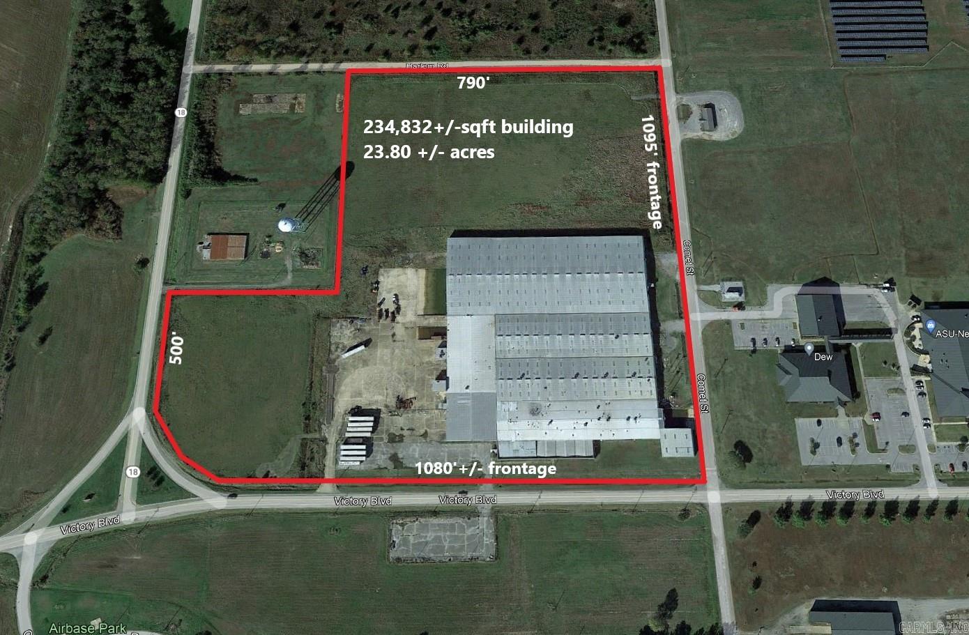 This 234,832+/- sq ft industrial building in Newport, AR is strategically located near the Newport Municipal Airport and the Arkansas State University Newport Campus. At only 2.3 miles to US-67, this well-maintained industrial/warehouse/distribution facility is situated on 23+/- level acres and has frontage on three streets. Property has many improvements completed in 2023,including repaired or replaced overhead doors, new LED lighting throughout, new roofing, new insulation, and more! Full list of 2023 improvements in documents and in brochure. Follow this link for more information from the Newport EDC about this property and the region:https://buildingsandsites.com/Property/Detail/21901