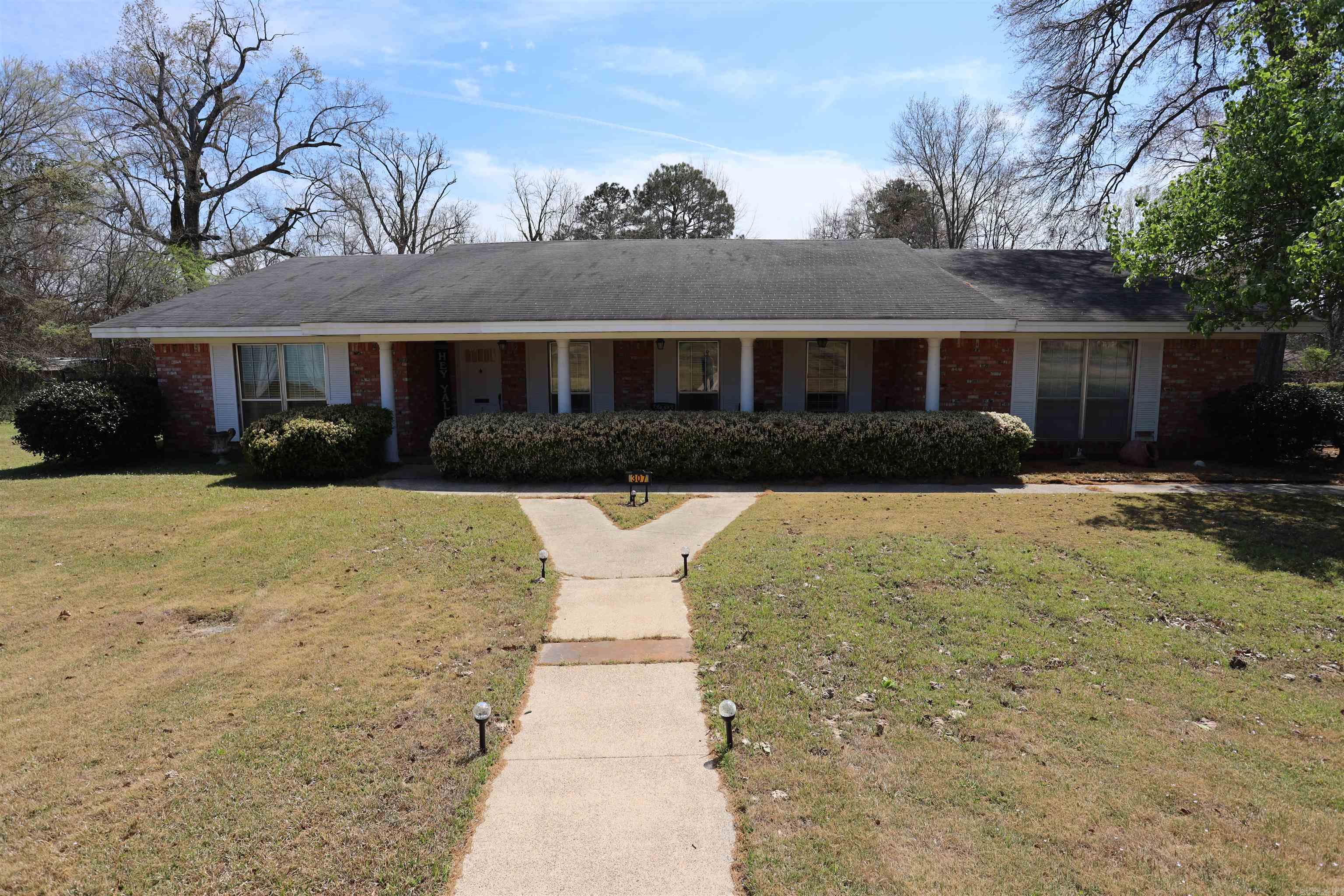 Beautiful, well maintained brick home located in the heart of Fordyce! This charming property sits on a spacious 0.98 acre lot, offering plenty of room to enjoy outdoor living while still living conveniently in town. Featuring 3 bedrooms and 2.5 bathrooms, and 2 car carport this home provides a comfortable and functional layout perfect for families or entertaining. This is truly a must see to appreciate.  Realtors: Please see Agent Remarks before showing property