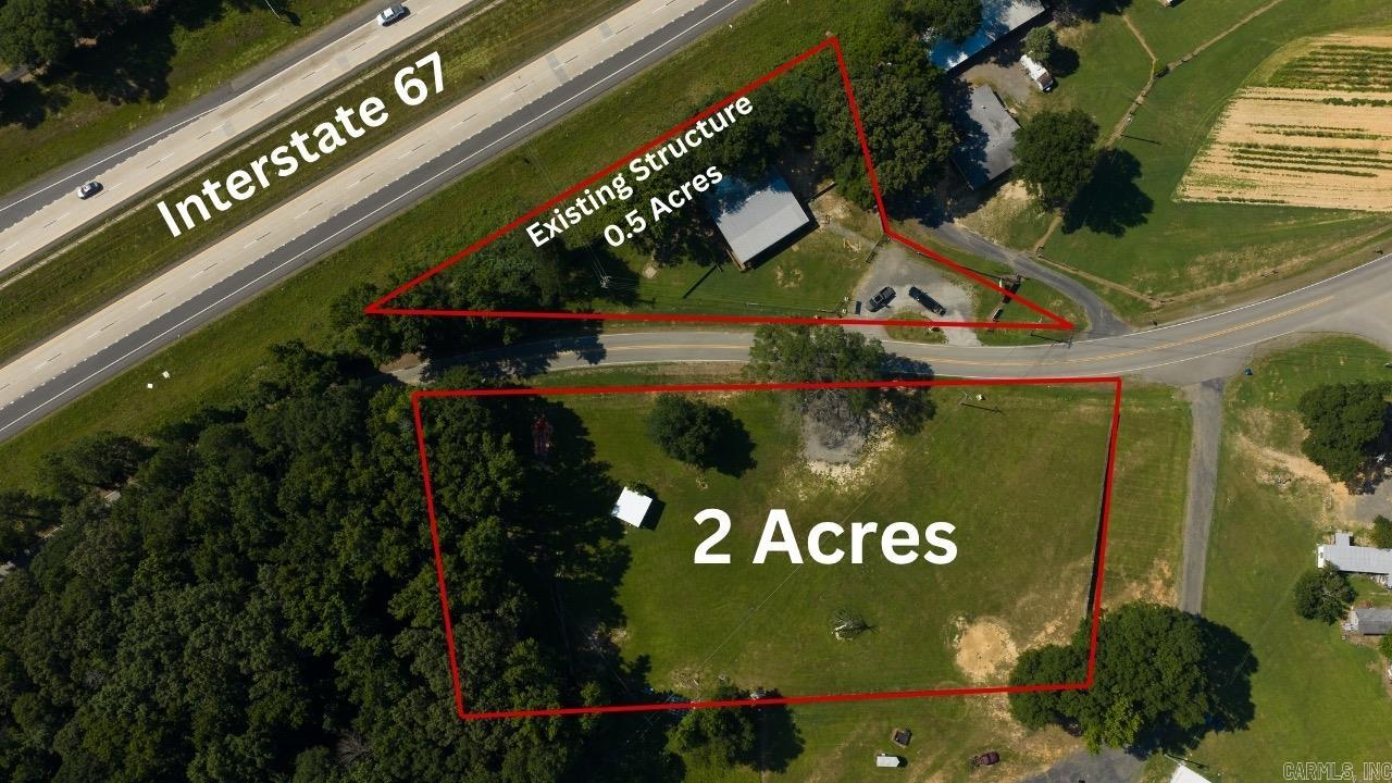 Investment/ development opportunity. Situated just off the new exit 22 on I-57 in the growing Austin, AR. 2.52 acres of total land already zoned for commercial use with a 2,000 SF building on site. The opportunities are endless with this tract in one of the fastest annual growth towns in Arkansas.