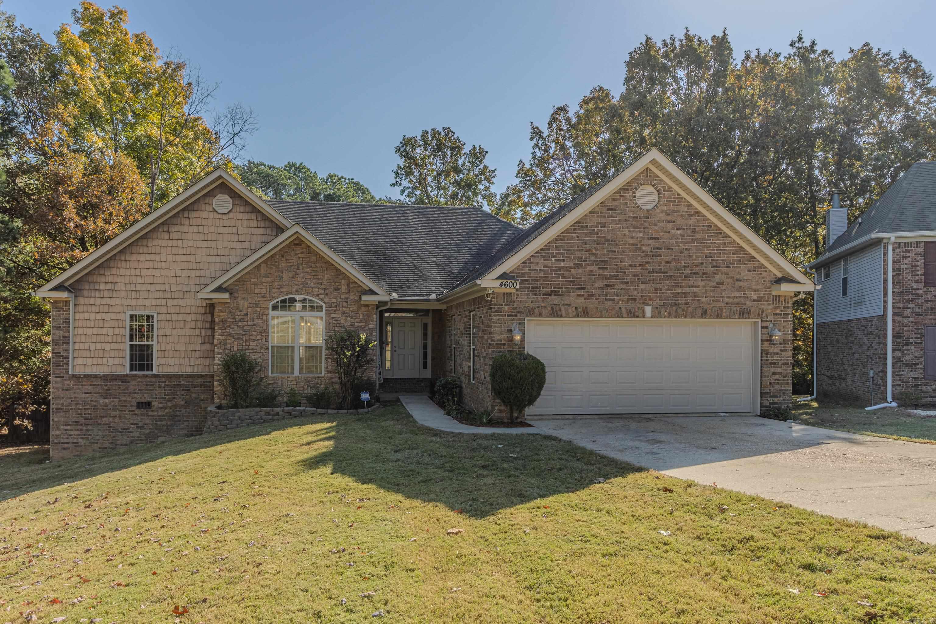 Spacious 4-bedroom, 3-bath home in Jonesboro with over 3,500 sq. ft. of living space on approximately half an acre, corner lot. On the main floor you will find the Primary suite with a large walk in closet, a separate shower and large tub. 2 guest bedrooms are located on the main floor as well! Separate dining room and an eat in kitchen with a breakfast bar. Laundry room and Tall ceilings with a gas log fireplace in the living area. Downstair Features include a walk-out basement, safe room, bedroom, living space and access to a one car garage. Outdoors boasts a fenced backyard, and a large above-ground pool with a deck. Enjoy a private setting with plenty of room for entertaining inside and out. Conveniently located, Valley View School District.