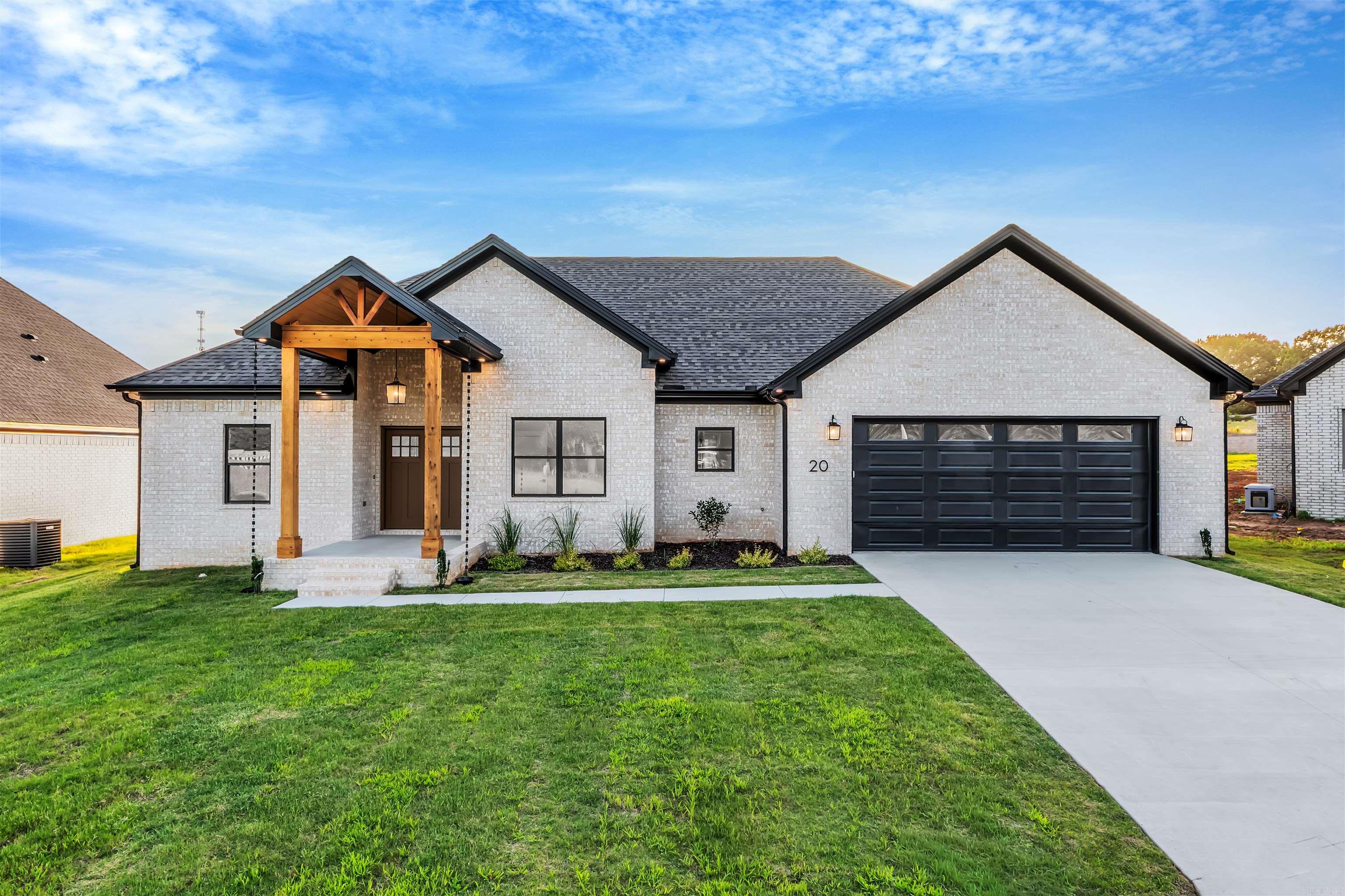 Discover this beautifully crafted new construction by Jacob Moix Construction nestled on a peaceful cul-de-sac in Windridge Estates. This 4 bedroom, 2 bath home offers 2,001 sq ft of smartly designed living space with a split layout that provides privacy and functionality. The open living, dining, and kitchen area creates a warm, inviting space perfect for gathering, entertaining, or relaxing at home. Thoughtful finishes, modern style, and energy-efficient construction make this home both stylish and easy to maintain. The primary suite is a true retreat with a spacious bath, while the additional bedrooms offer flexibility for guests, family, or a home office. Step outside to the covered patio and enjoy the level backyard—ideal for quiet evenings or weekend get-togethers. Conveniently located with quick access to Hwy 67/167, making commutes to Little Rock, North Little Rock, and Searcy a breeze. Just minutes from Cabot schools, shopping, dining, parks, and the Cabot Community Center.  Energy Efficient with Foam insulation on all exterior walls, Zip-board wrap on exterior, Tech Shield roof decking plus so much more!