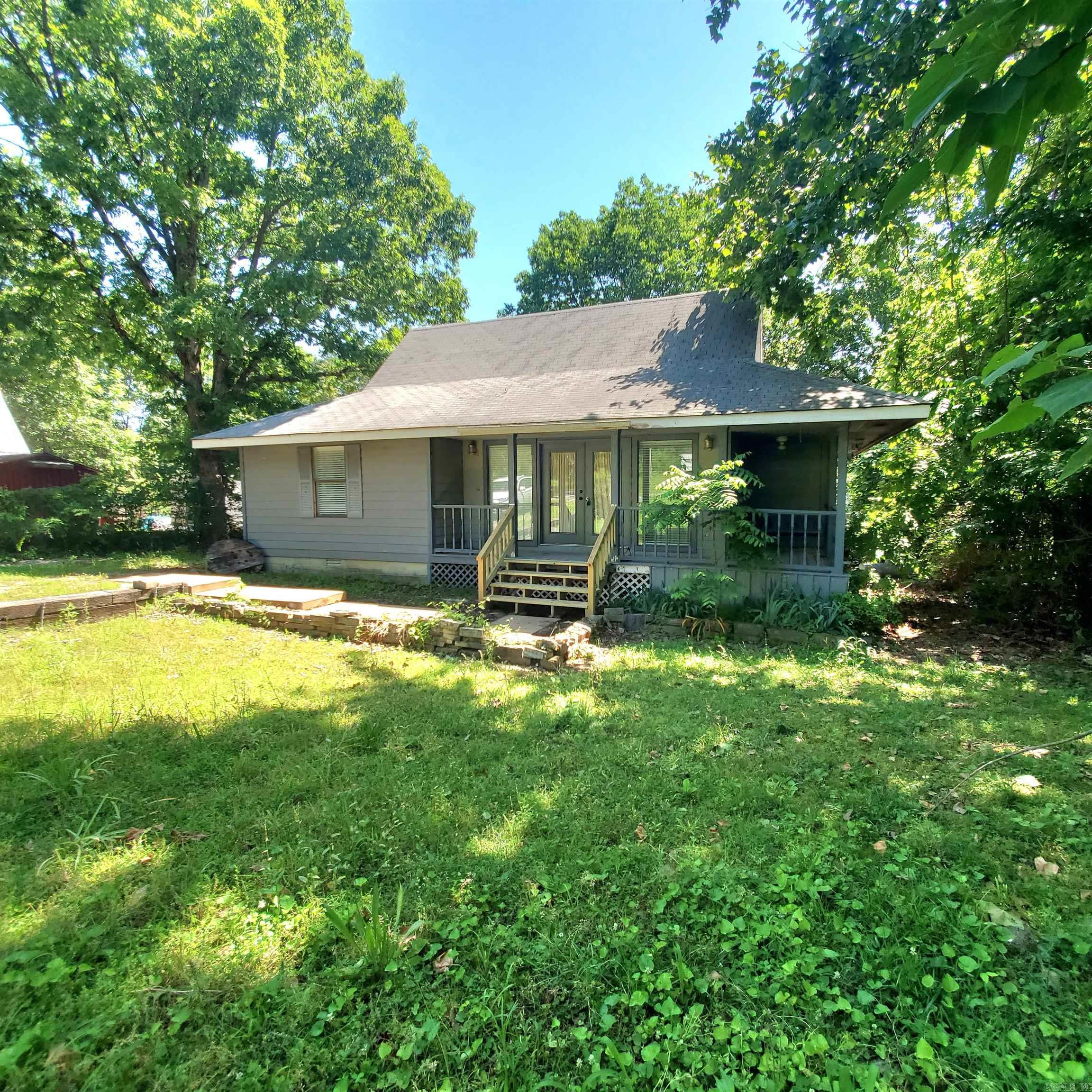 Such a gem!!! Check out this cute as a button home in town. 2 bedroom 2 bath home with an extra room that can be an office, game room for the kids or another bedroom. Upstairs is a loft area for even more sleeping space or a little nook for your reading area! There is a storage shed and a back deck. Plenty of room for a growing family. This property is very close to the park where the kids can play or you can go on the walking trail. The square isn't too far away either, where you can go relax and enjoy music on the weekends. Can be an income producer or your first home. Come and check it out!