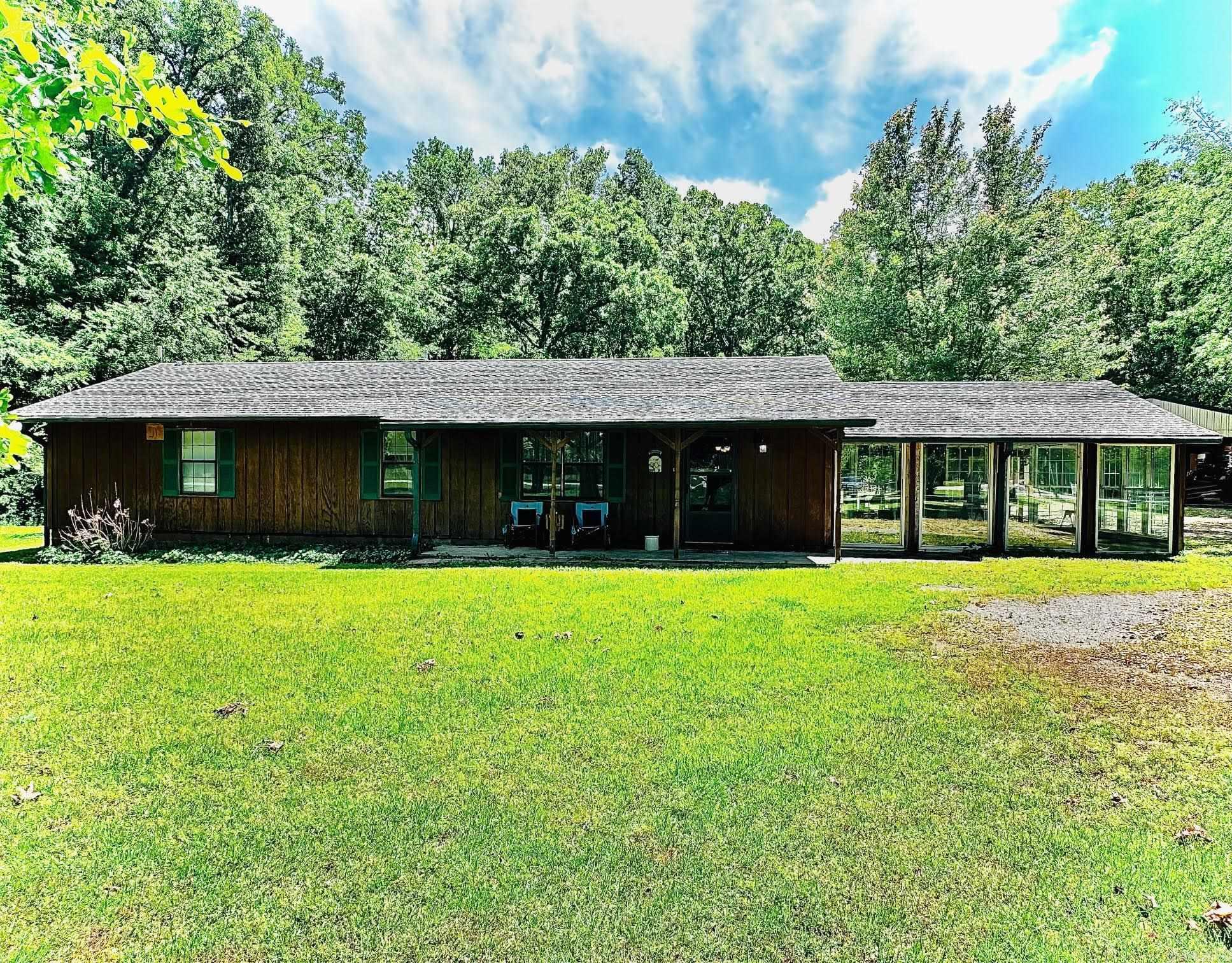 Nestled on approximately 3 peaceful acres in rural Beebe, this spacious 3-bedroom, 2-bath home offers the perfect blend of country living and convenience. Inside, you’ll find a large open-concept living, dining, and kitchen area that creates an inviting space for entertaining or everyday living. A versatile bonus room at the back of the home provides endless possibilities and could easily serve as a pantry, game room, storage area, hobby space, or home office. Enjoy quiet mornings or relaxing evenings from the enclosed sun porch while taking in the peaceful surroundings. Outside, the property features a large 2-bay shop building, perfect for projects, equipment storage, or additional workspace. Conveniently located just minutes from both Beebe and Searcy with quick access to the interstate, this property offers the tranquility of rural living without sacrificing accessibility. This is the perfect opportunity to enjoy space, privacy, and flexibility in a beautiful country setting. This home is a Must See! AGENTS See Remarks!