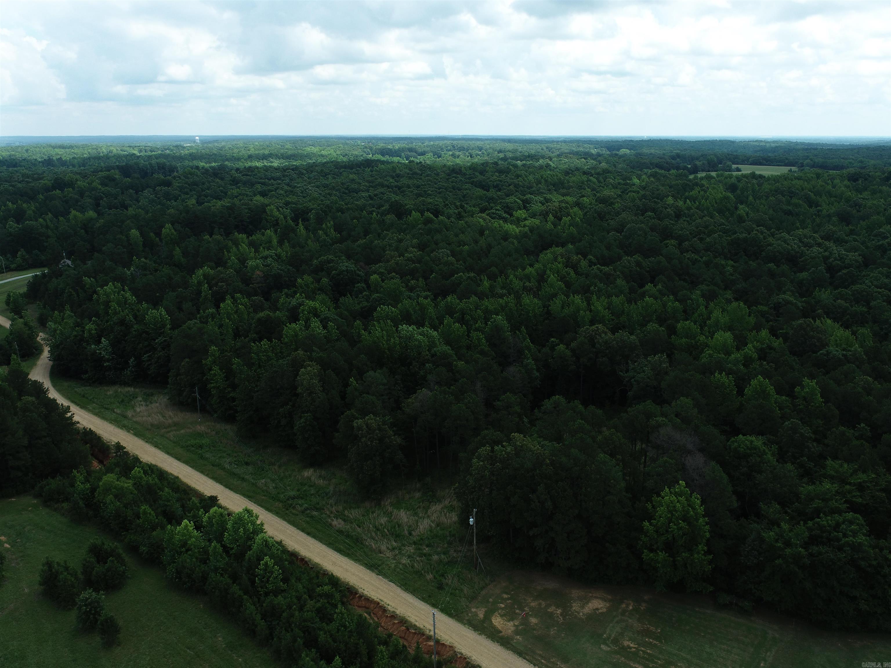 4.84 Acres located convenient to Paragould and Jonesboro. Property has Electric and water and has had a recent survey and perc test. Excellent property for you to build your new home on.