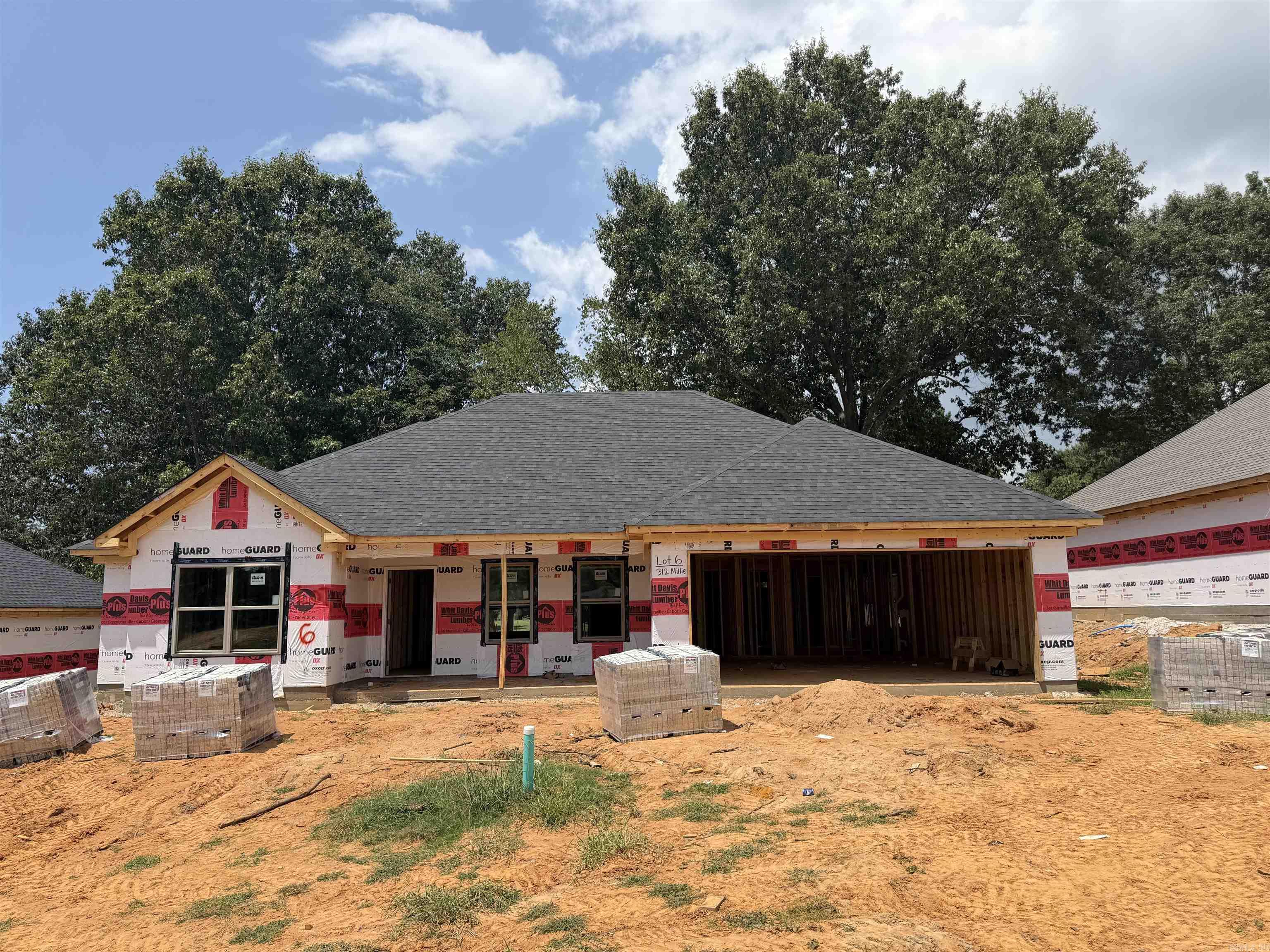 New construction waiting for you to make it your own! There is still time to pick finishes such as paint, backsplash, floors, shower tile, and countertops! This 4 bed 2 bath home backs up to a large field for the ultimate private feel! Huge custom shower in master, custom shaker style cabinets to the ceiling, kitchen island, stainless steel appliances, tray ceiling with custom wood beam accents, modern electric fireplace and big covered back porch! Estimated completion September 2026. Call your agent today before it is too late!