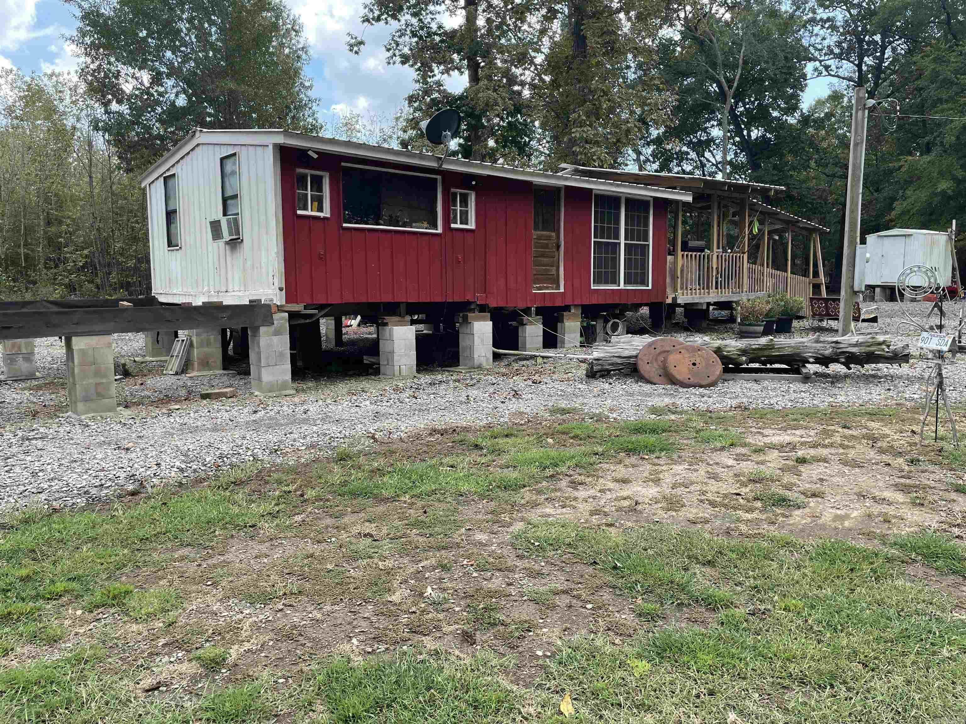 If you're looking for an affordable river retreat, take a look at this! The cabin is situated on 3 lots in the Nimmo Riverbank Subdivision, just a short walk or ride to the banks of the Little Red River in SE White County. The cabin has been a full time residence for the last several years and there are piers ready for you to add on to it to make it even larger for whatever your needs may be. Thousands of acres of public hunting and fishing land are just minutes away and the Little Red River and White River are right there as well making this a perfect place to make your headquarters for hunting and fishing trips. The property has SEWCO city water and the power is provided by Entergy. The sellers use Starlink internet.