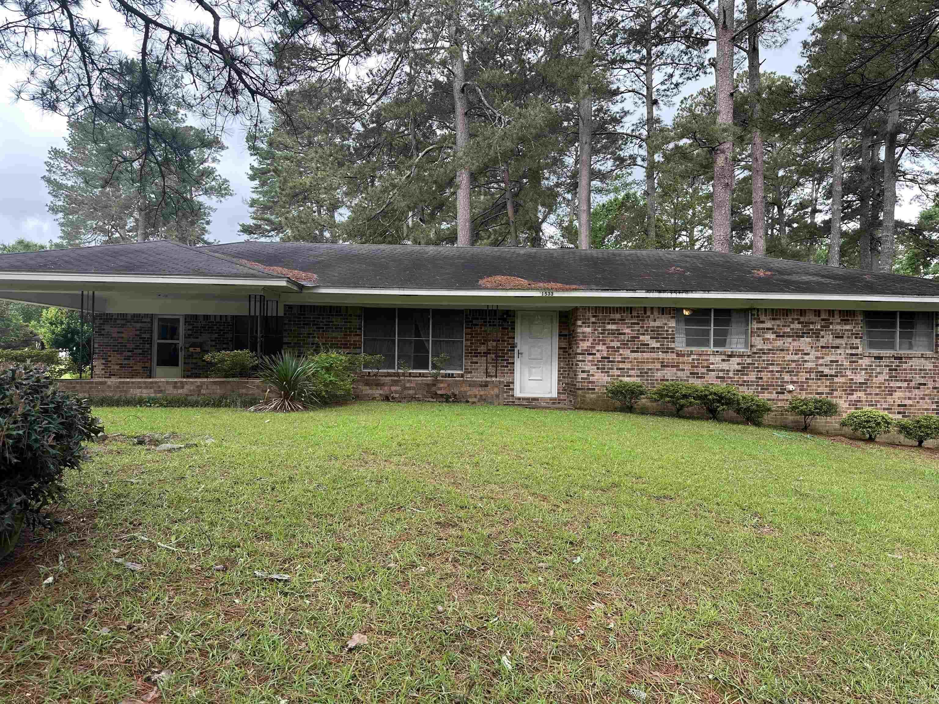 Home consists of a 1818sf 3BR 2BA brick home with a double carport, large fenced-in backyard on a corner lot.