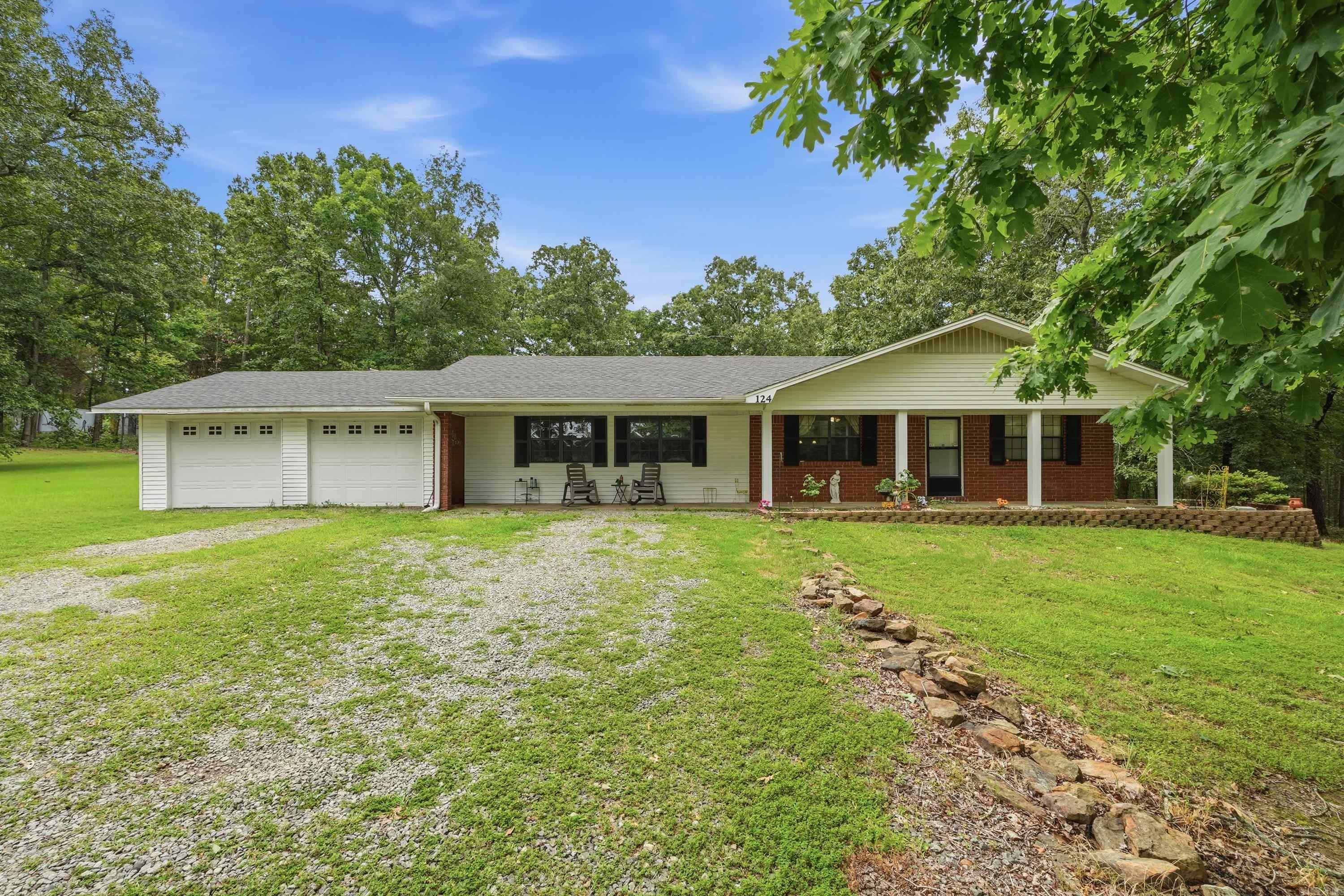 Welcome to relaxed country life in this spacious 3 bdrm 2 bath home near Rose Bud! Features include chef's kitchen with separate dining, living and family rooms plus master bdrm with en suite bath. This hidden gem situated on 1.47 acres offers ample space for a peaceful retreat. Mature trees surrounding the home provide privacy while the property's location 10 minutes from Heber Springs offers convenience. The backyard patio is the perfect spot for morning coffee, and seamlessly transitions to a space for grilling and outdoor dinners. Besides the 2 car garage, you'll find 2 buildings, 8x10 and 10x20, for ATV and boat storage. You'll also enjoy comfort and peace of mind with the new roof and HVAC systems installed in 2020. This charming home is ready for your personal touch to make it your own!