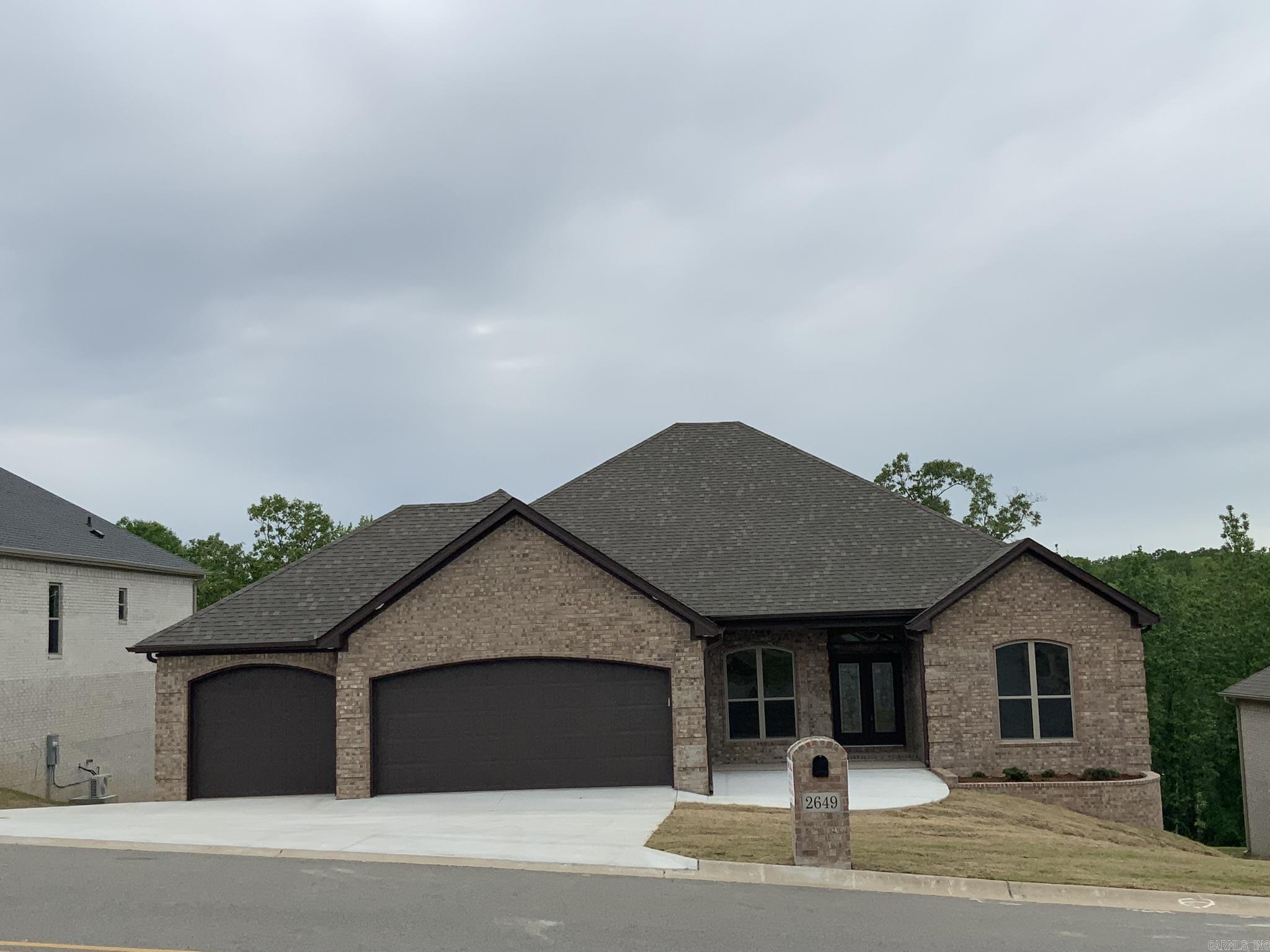 Awesome New Construction:  4 Bedroom, 3.5 baths, 3400 SF. home features a   Bonus room, 27x30 shop.  Open floor plan, luxury vinyl flooring.  Large laundry room with a sink and an abundance of cabinets, with access to the master closet.  Tiled walk-in shower, double vanity and soaking tub.  Kitchen features a large island, stainless steel appliances, painted cabinets, large pantry. Tankless hot water heater, Two decks, 3 car garage, under house storage.  Stairway to attic.  This house has an extra- large lot for a pool, also a green space in the back.   Enjoy the tranquility of a peaceful setting , the backyard is surrounded by nature and trees.