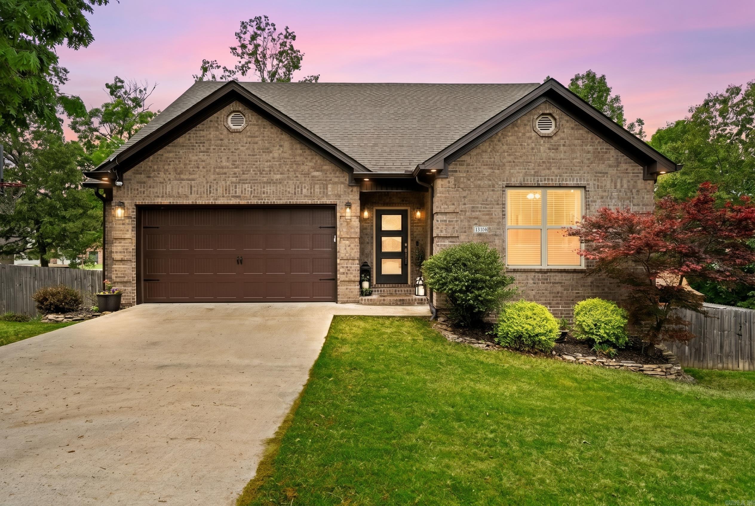 Just appraised at $455,000 April 2026. Seller offering $7,000 in buyer credits to be used toward paying closing costs, an interest-rate buydown, or a price reduction. Located in a gated community with lake access and resort-style amenities, including a clubhouse, swimming pool, tennis court, and scenic walking trails, this home offers the perfect blend of privacy and lifestyle. Situated on a massive wrap-around yard, the property features a covered deck overlooking peaceful scenery, ideal for relaxing or entertaining.  Inside offers a bright, open floor plan with luxury vinyl flooring and a spacious living area that flows seamlessly into the kitchen and dining space. The kitchen features granite countertops, double ovens, ample cabinetry, and a large workspace.  This 4-bedroom home includes 2 living room areas, a dedicated office, and a utility room with a built-in pet shower. The main level hosts the primary suite, mud room area, and an additional bedroom with direct bathroom access, while the lower level offers a large bonus living space, two bedrooms, an office, a full bath, and access to a large walk-in crawl space for additional storage possibilities. What a stunning Home!