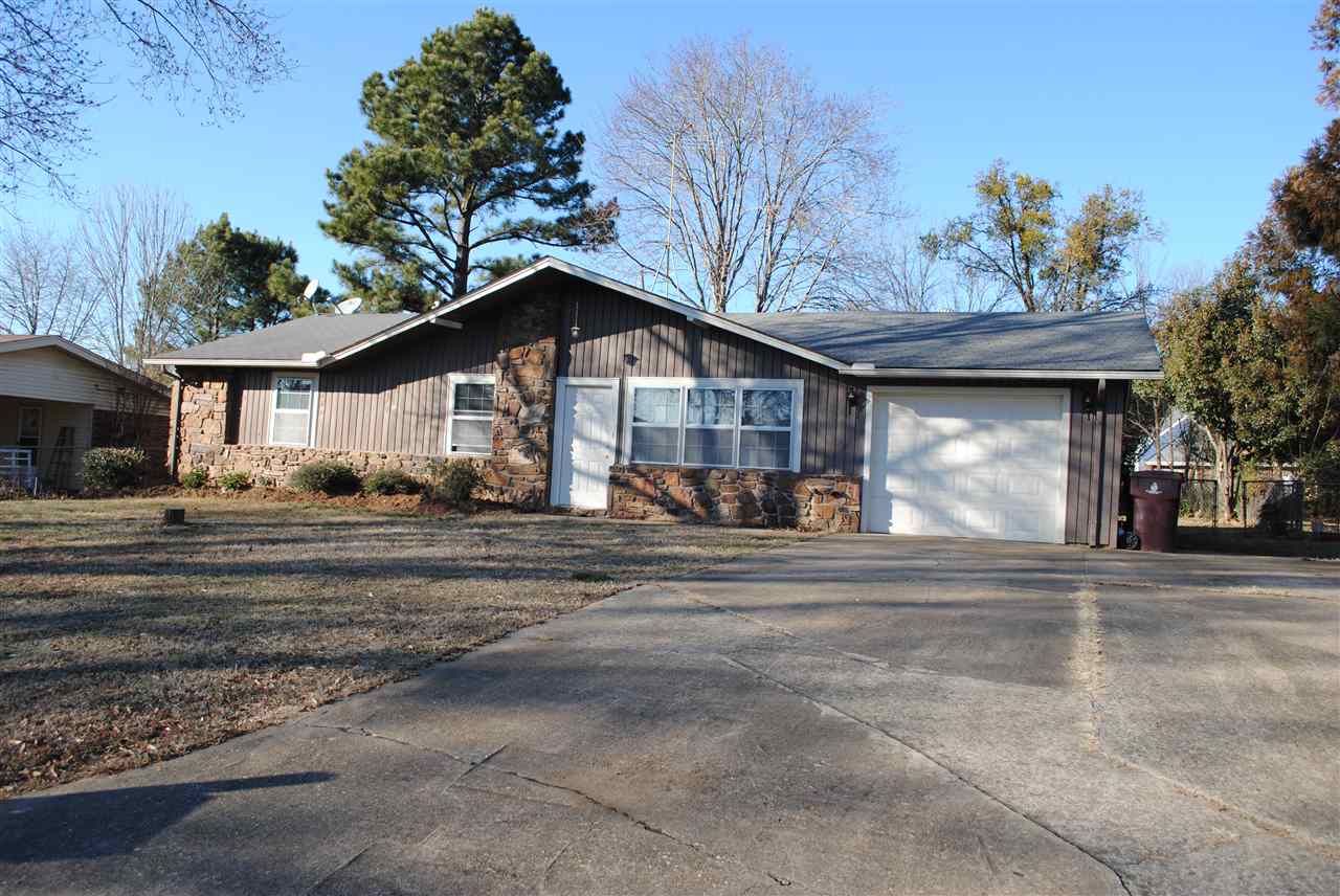 Great location close to Morrilton High School! Move-in ready!!  Stained concrete floors throughout.  Fresh paint.  New tile back splash and counter tops in the kitchen.  New muted glass sliding doors.  Vaulted ceiling in great room.  Tiled tub/shower combo.  Large (13.5'x27') single car garage.