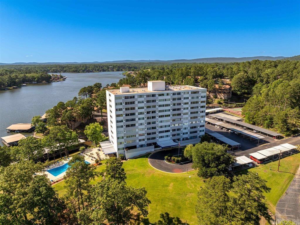Waterfront living with beautiful water and mountain views at 740 Weston Road in Hot Springs, AR. This 1-bedroom, 1-bath condo offers a great opportunity for a full-time residence, weekend retreat, or investment property. Currently used as a short term rental (STR), this unit offers both comfort and income potential. This unit is being sold with a STR license and fully furnished if desired, for a truly turn-key opportunity! Located in the Lake Hamilton School District, the community features desirable amenities including a pool, tennis courts, game room, party room, on-site laundry, gated access, and designated parking. Rental income available by request.