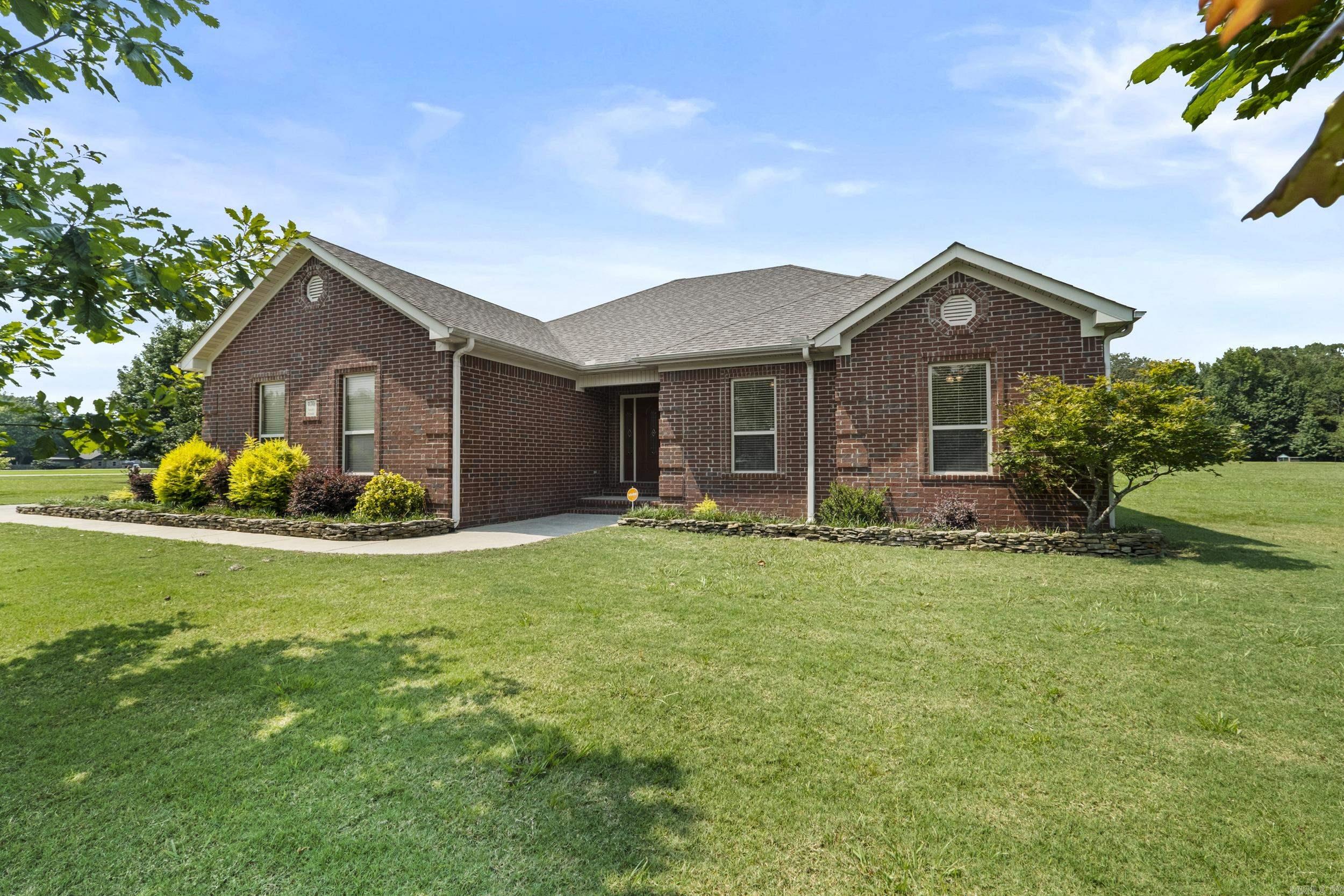 Pride of Ownership Shows in this Rare Find Home with Acreage in the Cabot School District! Nestled in the peaceful and serene Sandy Creek neighborhood, just outside the hustle & bustle, this Beautiful All-Brick, 3-bedroom, 2-bath home is a rare find! The inviting Great Room sets the tone, and in 2019 a Spacious 600 sq.ft. Craftsman Style Family Room was added Featuring Beautiful Wood Flooring, Large Windows, Vault Celings, & Rock Fireplace! A Perfect place to entertain or for Large Family Gatherings! The Kitchen offers Stainless appliances, Corian Countertops, Tile Backsplash, Pantry & Large Breakfast area! The Split Primary Bedroom is Spacious and Features a Private Bath with Dual Vanities, Walk-in Shower, Separate Tub and HIS/HER Closets! Both Spare Rooms are Large and Inviting! Sitting on Over an acre with a Storm Shelter for Peace of Mind. Well maintained and recent improvements include a New HVAC compressor in 2025 & the Roof is only 2 years old! Security System included. Don't miss this opportunity! Check out the Video!