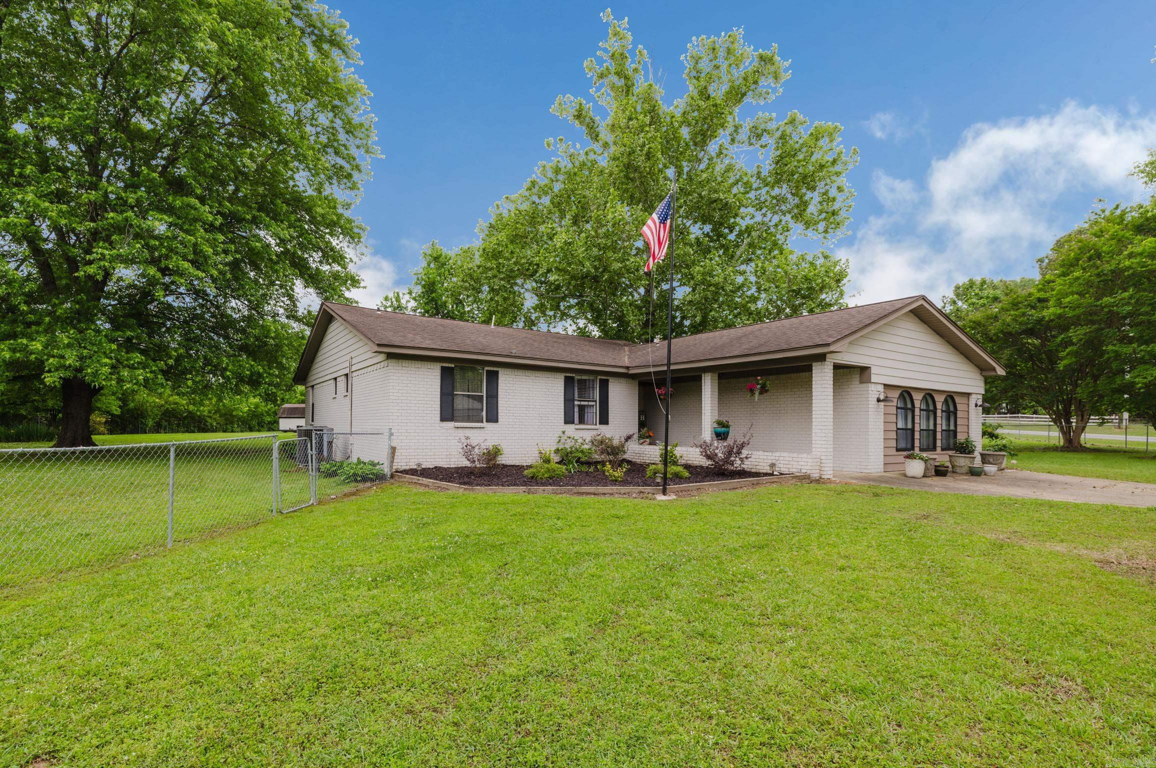 This home has new interior paint, New Flooring throughout with tile in Bathrooms. The kitchen has granite countertops with a pantry. The great room has a vaulted wood ceiling and a gas insert fireplace that could be converted back to wood burning. A versatile bonus room provides the perfect space for an office, game room, or potential 4th bedroom.. The Backyard is completely fenced and with over an acre gives family plenty of room to enjoy. There is also a 30 X 20 Shop with an 8 X 12 Storage building, ideal for hobbies, storage, or workspace.