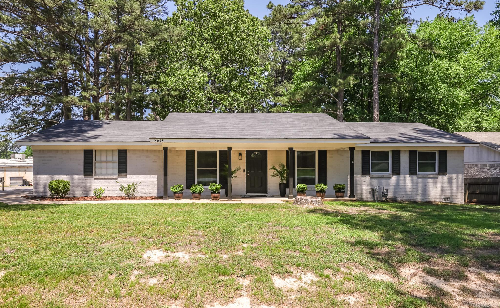 Completely updated and move-in ready, this 3 bedroom, 2 bath home offers an open floor plan with granite countertops and stainless steel appliances. A dedicated office plus a versatile bonus space with a brick accent wall provide flexibility for a second living area, playroom, or workout room. The spacious, fully fenced backyard features mature shade trees, a storage building, and a covered deck—ideal for outdoor living. Major updates include a new roof in 2025, HVAC approximately 6 years old, and water heater approximately 4 years old.