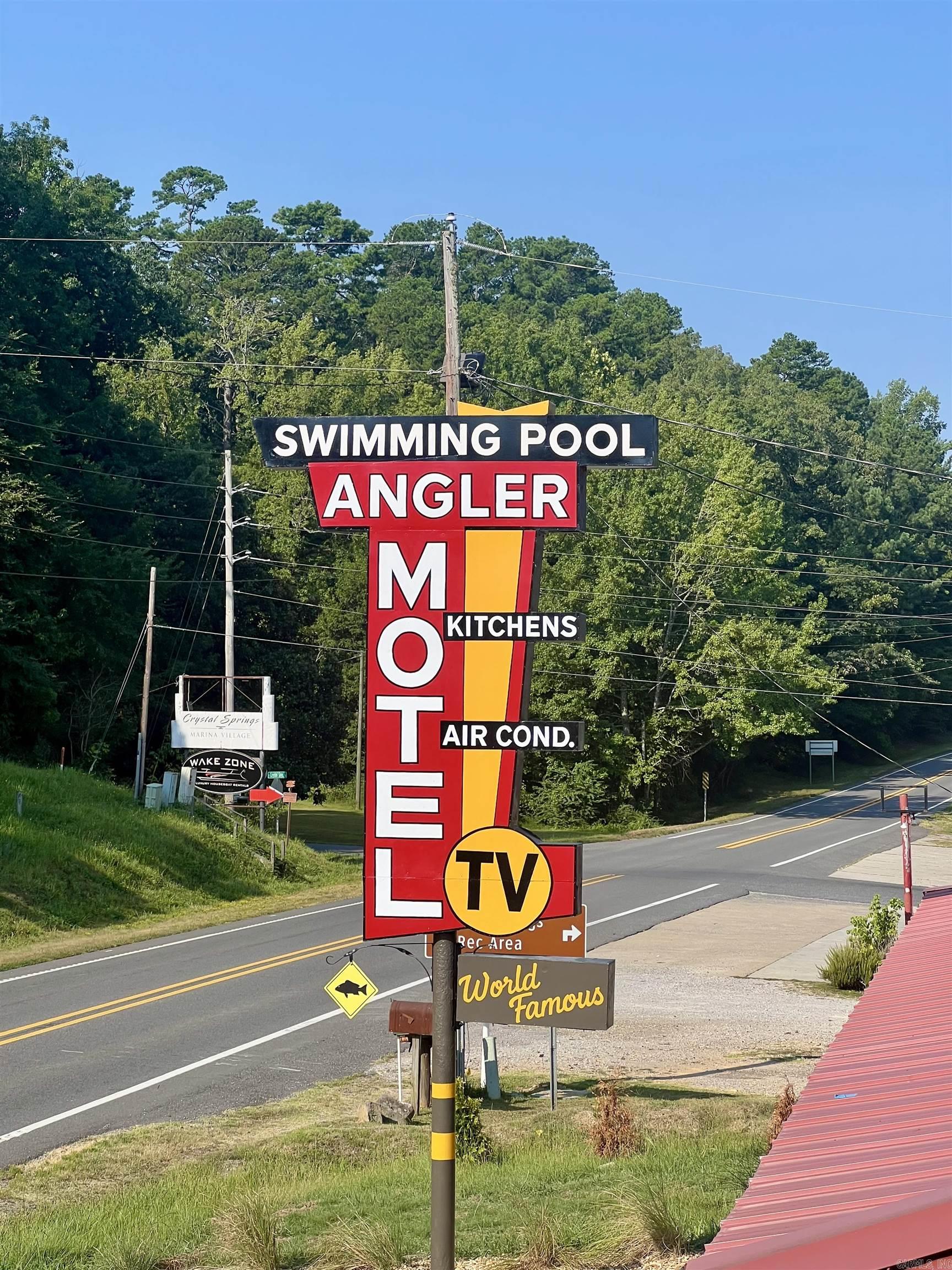 Investment or Getaway Opportunity at The Angler Motel – Royal, AR  Owner Financing Available at Just 4.9%! Discover a unique opportunity to own a deeded room at The Angler Motel. This property has been converted into a Horizontal Property Regime, allowing individual ownership of fully furnished rooms that can be used as nightly rentals, investment properties, or your own personal vacation retreat near beautiful Lake Ouachita and Hot Springs.  This unit features a queen-size bed and a private bathroom, all designed for comfort and convenience. Units are sold fully furnished and rental-ready, making this a truly turn-key investment.  The property offers excellent shared amenities, including a swimming pool, clubhouse, and picnic area for guests and owners to enjoy. All exterior maintenance, utilities, internet, and property upkeep are included in an affordable monthly POA fee, covering all common expenses and ensuring a worry-free ownership experience.  Whether you’re looking to generate rental income or simply want a weekend getaway near the lake, The Angler Motel offers a rare blend of affordability, convenience, investment potential, and favorable seller financing in one package.