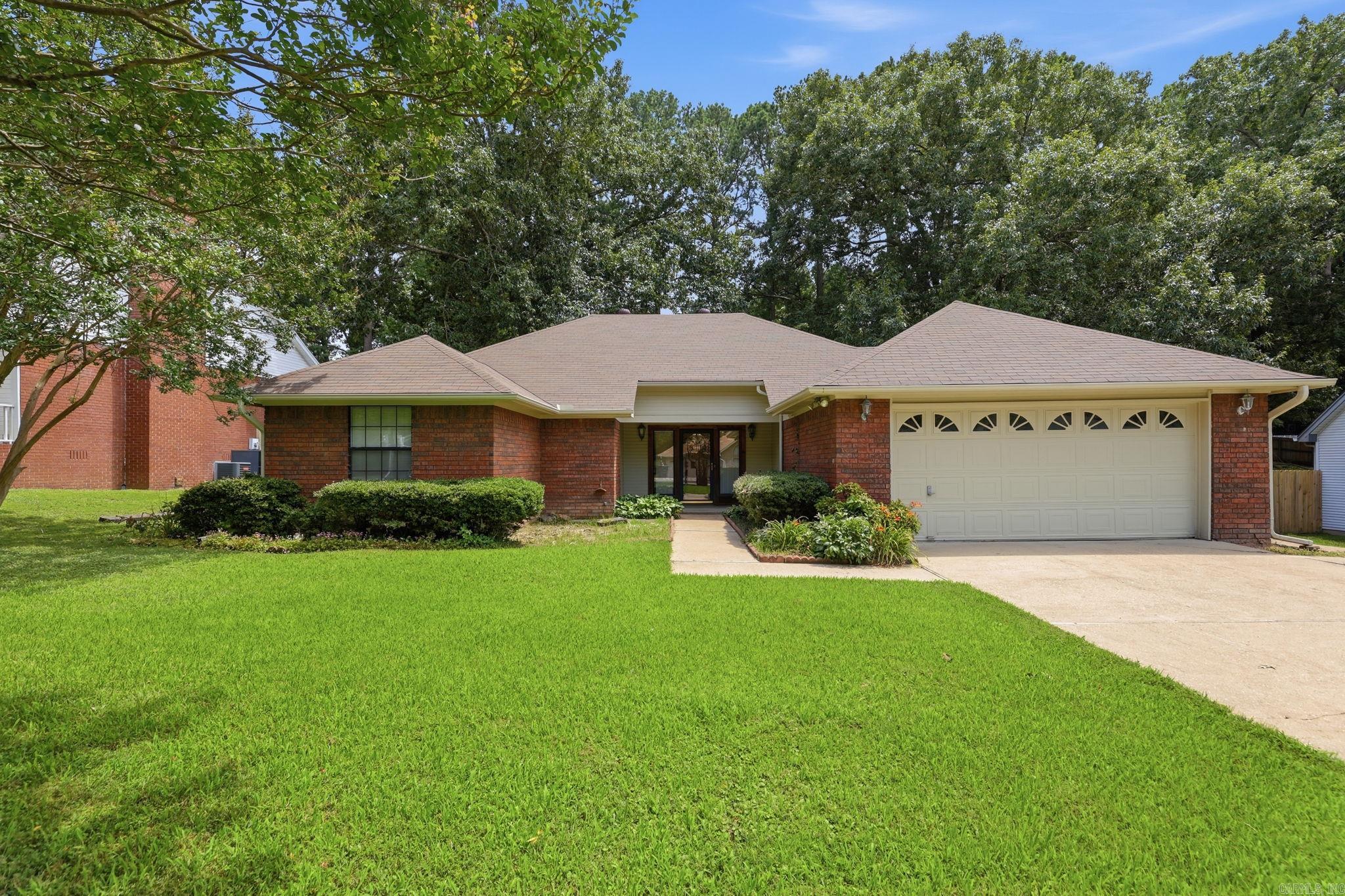 Welcome home to this beautifully maintained 3-bedroom, 2-bath home in the heart of Bryant! Conveniently located near Bryant Schools, this move-in-ready property offers the perfect blend of comfort, style, and convenience. You'll love the beautiful hardwood floors, while the bedrooms feature brand-new carpet for added comfort. Fresh paint throughout the home creates a bright, clean feel, making it ready for its next owner.  The HVAC system is approximately 2 years old, providing peace of mind and energy efficiency. This home has been thoughtfully cared for and it shows in every detail. From the inviting curb appeal to the well-kept interior, pride of ownership shines throughout. Step outside to enjoy the back patio, perfect for relaxing, entertaining, or enjoying your morning coffee.  Don't miss this opportunity to own a well-maintained home in one of Bryant's most desirable locations! Agent see remarks.