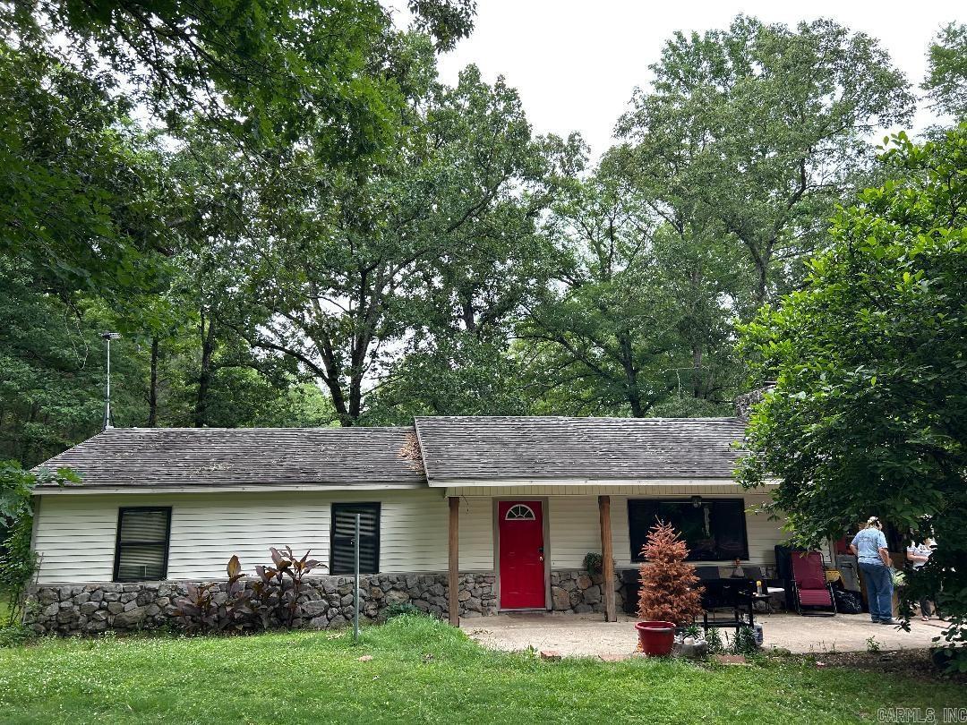Discover quiet country living on S. Harris Rd. This charming Pearcy property sits on a beautiful parcel with room to roam, garden, or expand. The home offers a warm, inviting interior with an easy-flow floor plan and peaceful views from every window. Whether you're looking for a full-time residence or a weekend retreat, this location provides privacy while still being just minutes from Lake Hamilton schools and Hot Springs conveniences. More pictures to come.