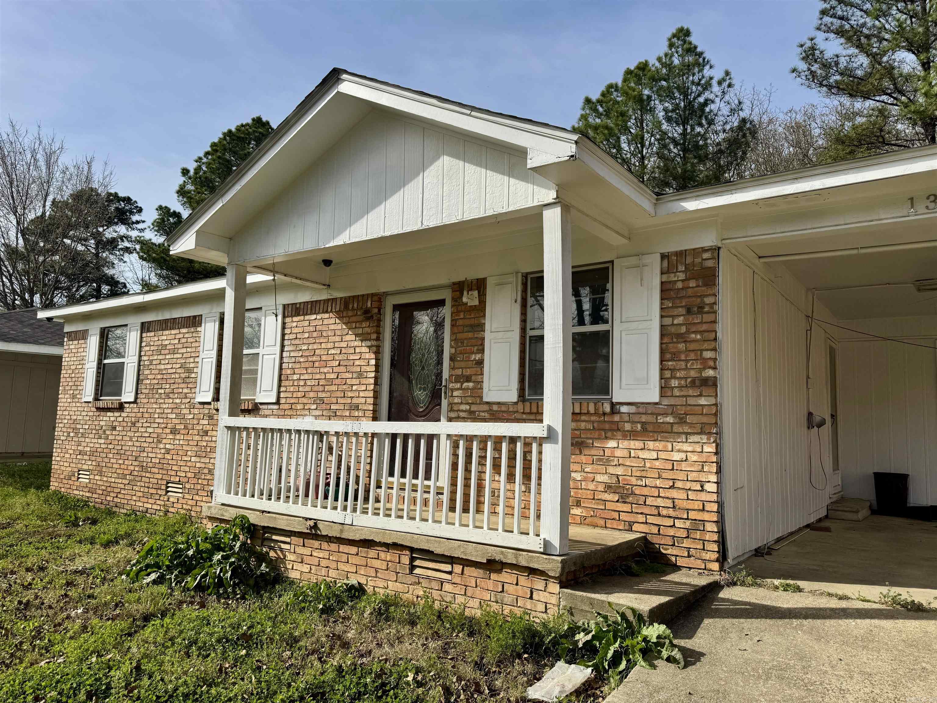 Great investment opportunity with updates already in place! This 3 bedroom, 1.5 bath home offers a spacious living room and a functional kitchen with plenty of counter space and included refrigerator. Enjoy the charm of the cute front porch, along with the convenience of a carport with storage room and two storage buildings in the backyard—perfect for extra storage or workspace. A solid option for investors looking to add to their portfolio or for a rental property!