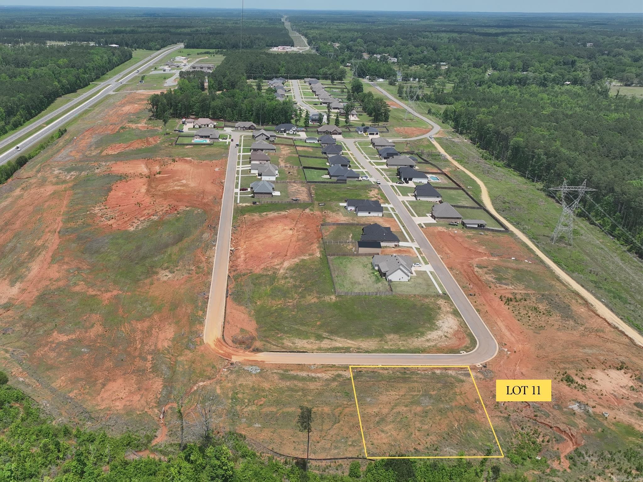 Build your future home in the peaceful Oak Tree South subdivision in Sheridan, Arkansas. Lot 11 offers a convenient location just minutes from Hwy 167, providing quick access to Sheridan, Little Rock, and surrounding areas while still enjoying a quiet residential setting. This homesite combines small-town comfort with easy access to shopping, dining, schools, and everyday amenities. Don’t miss this opportunity to own a residential lot in one of Sheridan’s growing areas.