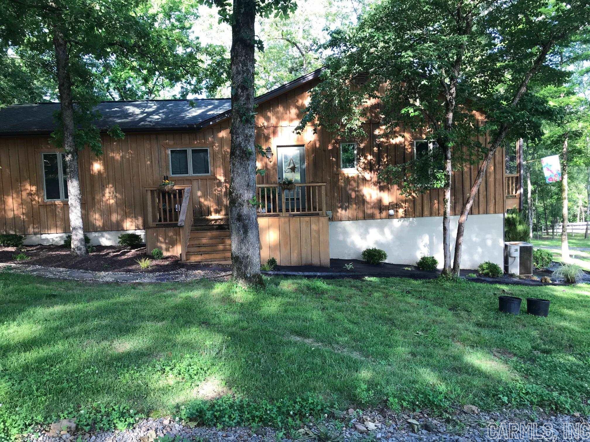 House and Land completely remodeled over past 5 years. Barn with 3 stalls and tack room; outdoor arena; beautiful Batesville mountain creek on property; riding trails; and fenced. House has open floor plan with all new everything including HVAC. Adorable, Guesthouse/cabin located on property w/addtl 1050 sq ft that can be for family or serve as a short term/long term rental for additional income. Property is very private and very peaceful! Greenbrier school district and Southside school district split up on main Rd at Leonard Loop (both schools have busses run there)