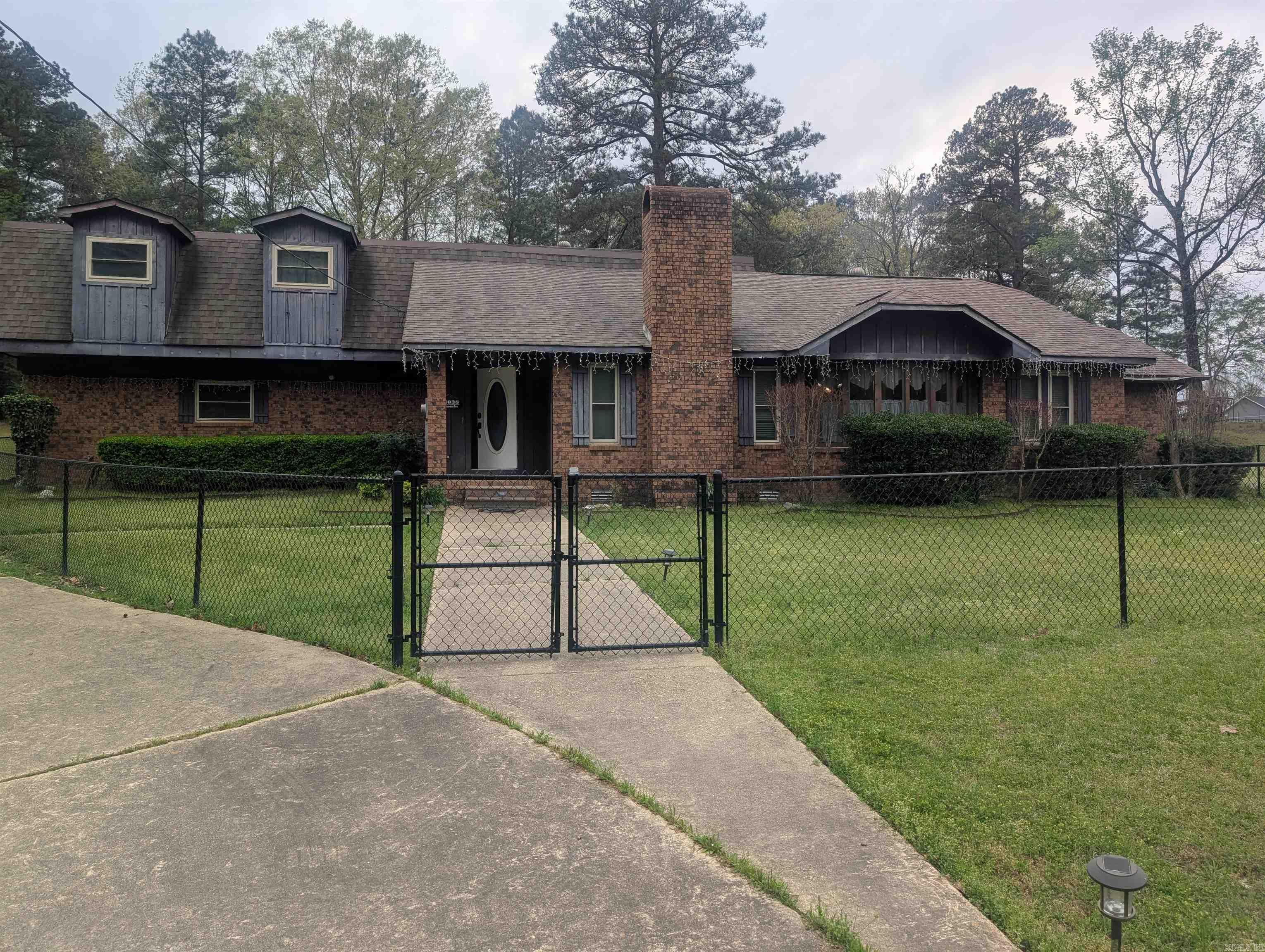 This beautiful 4 bedroom/3 bath property sits in a picturesque rustic setting on the Stephens Highway in Mt. Holly.  It boasts large living spaces and 3.02 acres with a front gated area for you children and fur babies. The spacious kitchen has beautiful granite countertops, lots of storage and a breakfast area.  The formal dining has a fireplace and beautiful natural light from the large window.  There is a 2 car garage and a boat RV shed for your camper or boat. There are 2 family room areas for large families or large crowds during home entertainment activities.  You must see this beautiful property to appreciate it. Square footage, lot size, and acreage is taken from courthouse records.