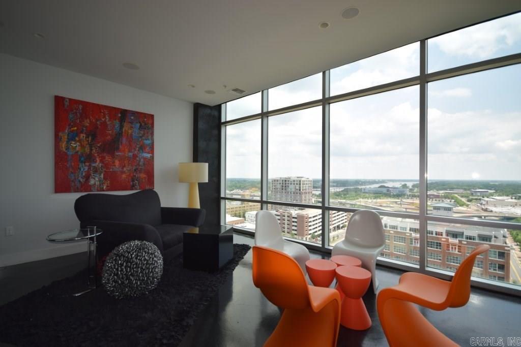Large, open 1BR/2BA plan (can easily be converted back to a 2BR with addition of one wall) . Located in Little Rock's premier condo tower, 300 Third. Breathtaking views of the Arkansas River and the River Market District throughout the condo. Dark concrete floors, quart countertops, large master bedroom with an abundance of closet space, HUGE master shower.  Hidden space behind kitchen for utility room, fridge, extra storage.  A great amount of space (and spectacular view) for the price!