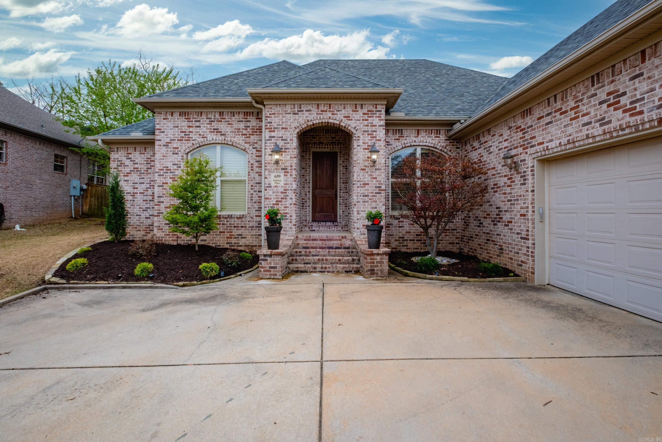 Chenal Valley home! This beautifully crafted one level, 4 bedroom, 3 bath home has community, comfort and convenience waiting for you! The striking brick exterior makes a lasting first impression. Step inside to an open floor plan that is a perfect balance of elegance and functionality. The heart of the home is in the chef's kitchen which opens to the spacious hearth room with a cozy fireplace. A formal dining room (can also be flex space) with adjacent private office makes working from home a convenience. Enjoy a private primary suite with spa like primary bath which includes water closet, jetted tub, separate shower and his/hers vanities with ample closet space. Relax all year on the covered back patio. Abundance of space for family and friends to gather. Don't miss this opportunity to experience Chenal Valley living at its finest. Agents see remarks.