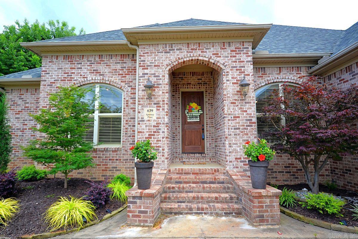 Chenal Valley home! This beautifully crafted one level, 4 bedroom, 3 bath home has community, comfort and convenience waiting for you! The striking brick exterior makes a lasting first impression. Step inside to an open floor plan that is a perfect balance of elegance and functionality. The heart of the home is in the chef's kitchen which opens to the spacious hearth room with a cozy fireplace. A formal dining room (can also be flex space) with adjacent private office makes working from home a convenience. Enjoy a private primary suite with spa like primary bath which includes water closet, jetted tub, separate shower and his/hers vanities with ample closet space. Relax all year on the covered back patio. Abundance of space for family and friends to gather. Don't miss this opportunity to experience Chenal Valley living at its finest. Agents see remarks.