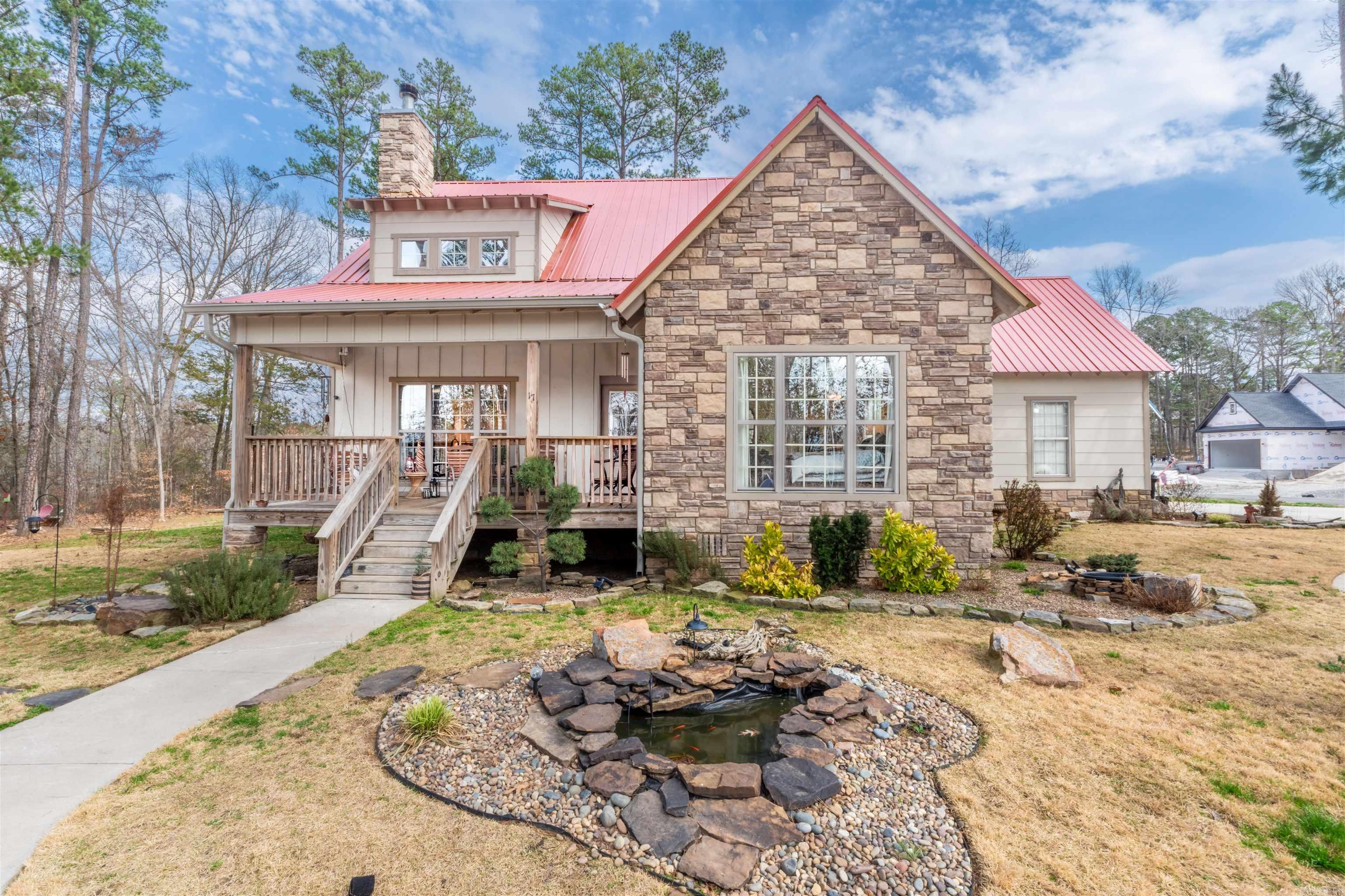 Welcome to 17 Diane’s Loop in beautiful Heber Springs, Arkansas — where living near the Little Red River and being just minutes from Greers Ferry Lake gives you the best of both worlds.  This 3-bedroom, 2.5-bath home sits on a rare double lot and blends comfort with luxurious cottage charm. The split floor plan offers privacy for the primary suite while keeping guest bedrooms perfectly positioned for family or friends.  The inviting living spaces flow effortlessly to a beautiful porch just off the kitchen — ideal for morning coffee or winding down after a day on the water.  The spacious double lot adds extra room to spread out and enjoy, complete with a fire pit and horseshoe pit for relaxed evenings and easy entertaining.  With a community boat dock on the Little Red River and a boat launch on Greers Ferry Lake less than 10 minutes away, this home is perfect as a full-time residence or weekend escape.  It’s not just a home — it’s the lifestyle you’ve been looking for.