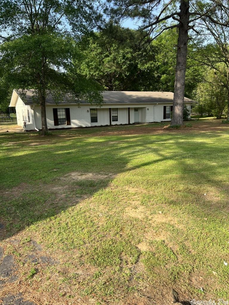 Open living area with vaulted ceilings, kitchen has granite counter tops, lots of cabinets, and a separate pantry.  On the end of a quiet road, over 3.5 acres, nice 4 bed, 2 bath home with an office/craft/extra living room area.   This home requires flood insurance.   On Beaverfork Water  Septic was cleaned out in 2021.