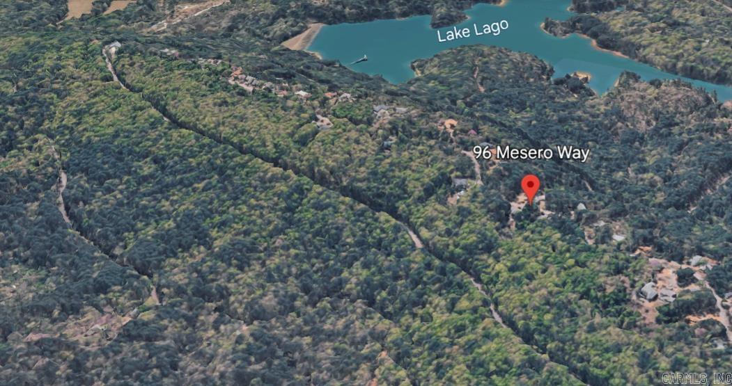 Build your dream home where the views never end. Perched at the highest reaches of Hot Springs Village, this buildable lot offers the rare opportunity to own a piece of a mountain paradise. Located on a premier scenic road, the property is tucked between two beautiful homes, ensuring a settled neighborhood feel with utility proximity already established. If you’ve been waiting for the perfect vantage point to start your next chapter, this is it.