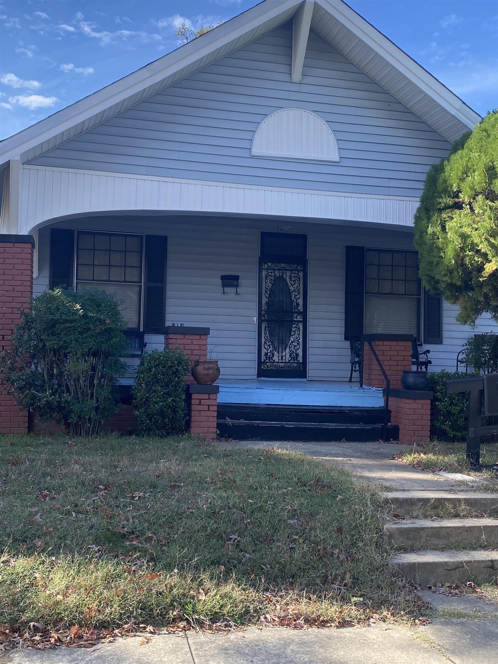 Quaint home nestled in the heart of Central Little Rock. This cute little bungalow is a charming haven.  Its cozy interiors and quaint design offer a perfect retreat. Original moldings, millwork and doors add charm to each room. Original French doors draw you to the formal dining room and secondary bedroom. Large primary bedroom has two separate entrances. Newer deck out back. 4' chain link around back yard.  Excellent location - easy access to I-630 and just a few blocks from the Children's Hospital. Hot water heater 2 years old. Roof 1 1/2 years old. Refrigerator conveys.  Separate laundry room.  Must see! Square footage approximate. No Sellers Property Disclosure as seller has not lived in the home. Please measure. Property is being sold "As-Is". Agents, see showing remarks.