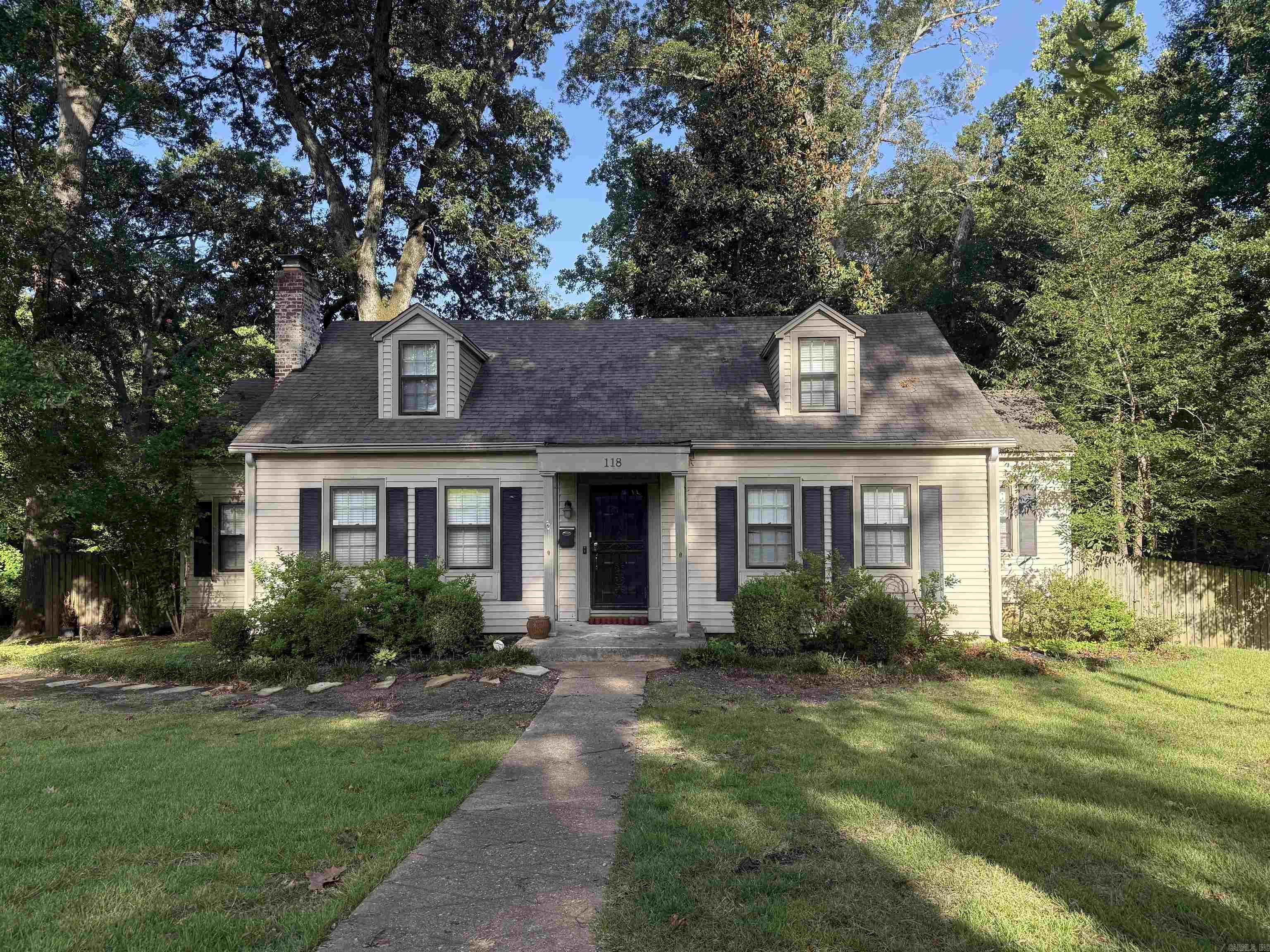 A charming home located on a beautiful, tree-lined street in an established neighborhood. This well-maintained property features an older home full of character, complemented by numerous recent updates throughout. Enjoy a spacious, shaded backyard with an oversized deck—ideal for outdoor living and entertaining. A cozy fireplace creates a warm focal point in the living area, adding charm and comfort to the home. Throughout the interior, fresh paint in modern, neutral tones brightens each room and gives the entire space a crisp, move-in-ready feel.